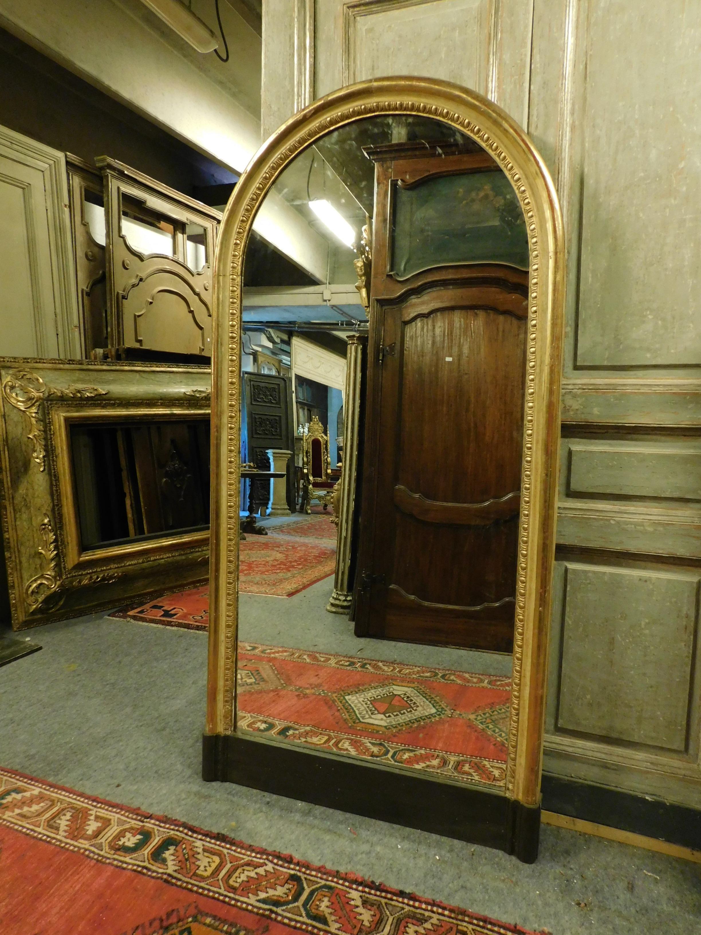 arched antique mirror