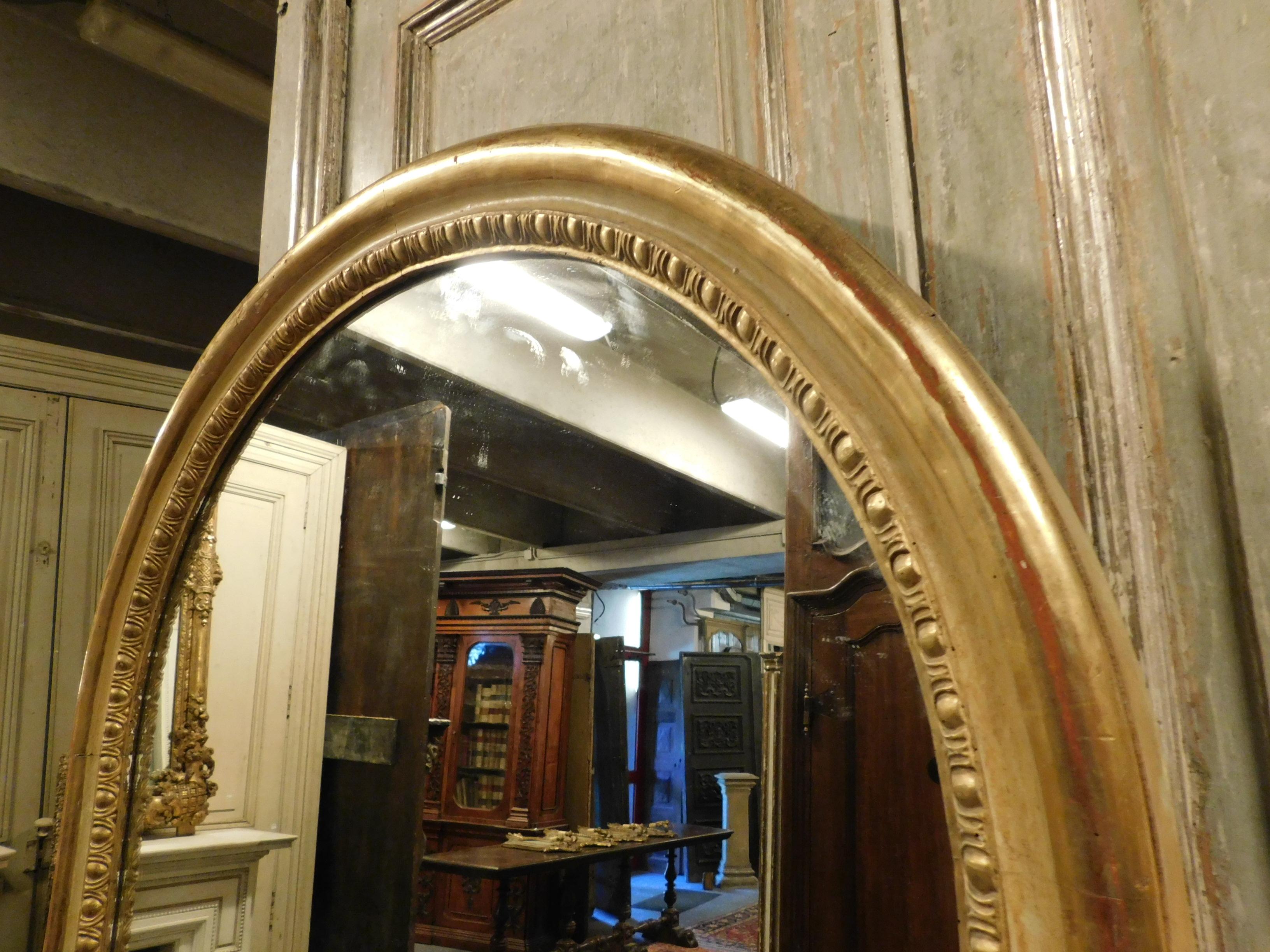 Italian Antique Mirror Early 1800, Gold Leaf, Arched Form with New Mirror