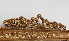 Antique Mirror in gilt wood frame with floral ornaments, France 19th Century