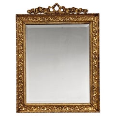 Antique Mirror in gilt wood frame with floral ornaments, France 19th Century
