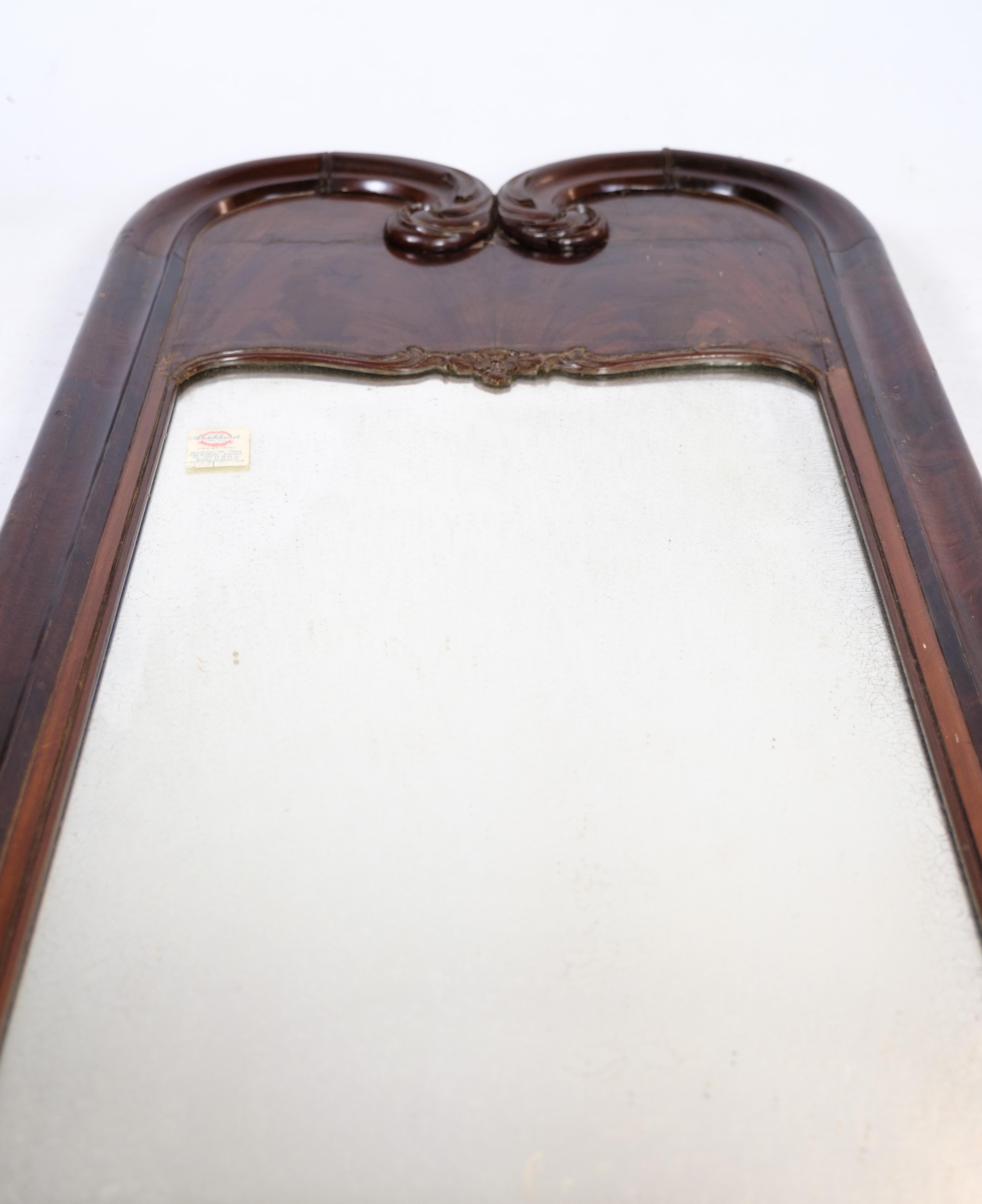 Antique mirror with hand polished mahogany originally from Denmark around the 1880s.
Dimensions in cm: H: 153 W: 59.