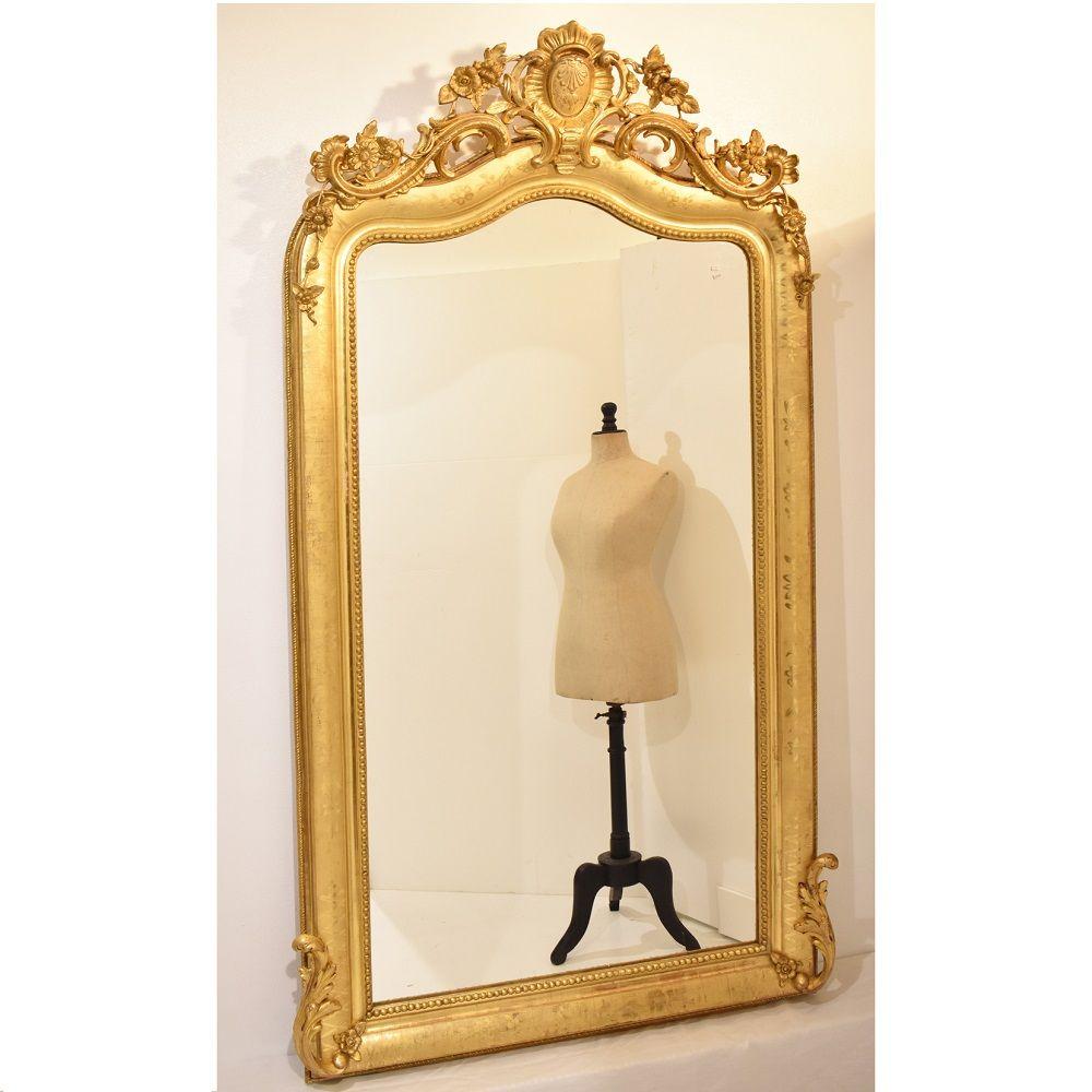 The Antique Wall Mirror proposed here has a Golden Frame in pure Gold Leaf.
This antique rectangular wall mirror was realised in the 19th century XIX. Charles X.

We can note that the mirror and the back are authentic and original and that the