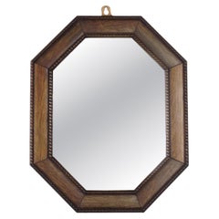 Miroir ancien avec cadre en bois foncé du XXe siècle