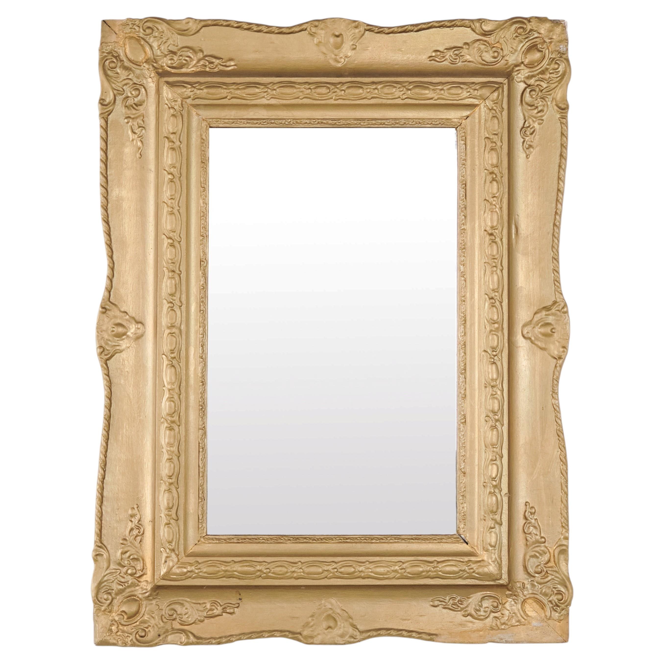 What is a gilded wood frame?