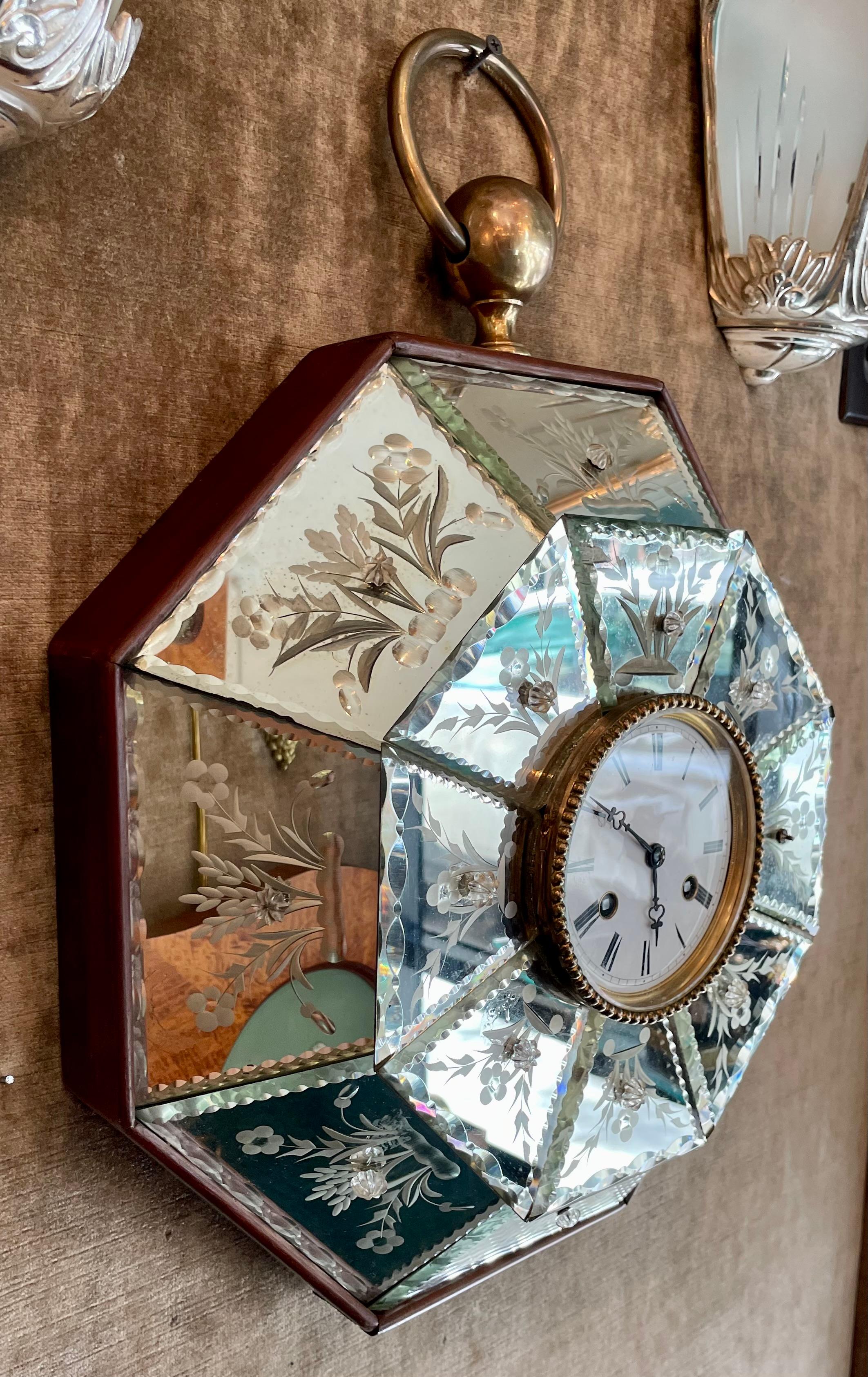 Antique mirrored & diamond-etched wall clock.