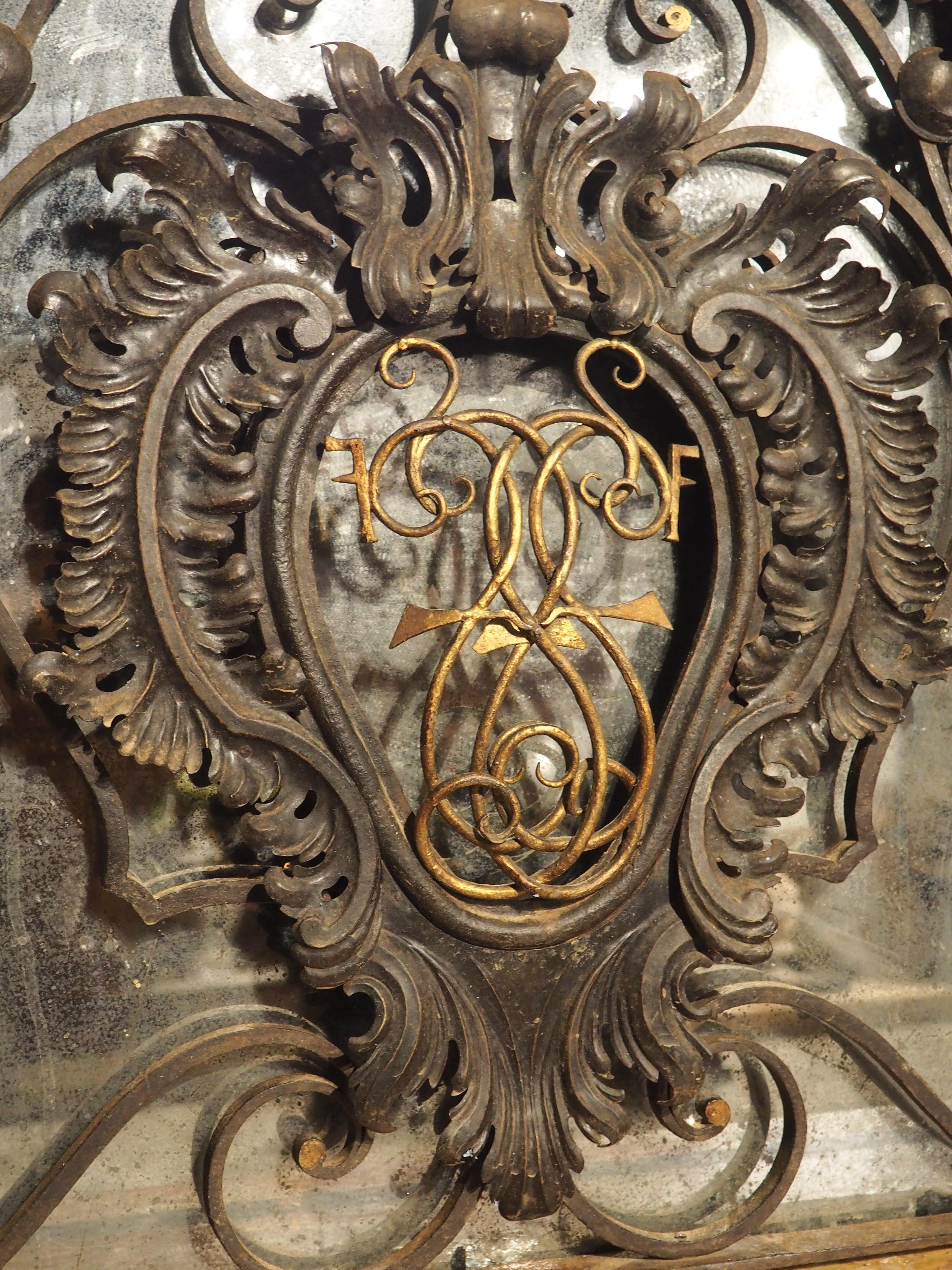 Glass Antique Mirrored Wrought Iron and Tole Overdoor with Cartouche, France, C. 1850