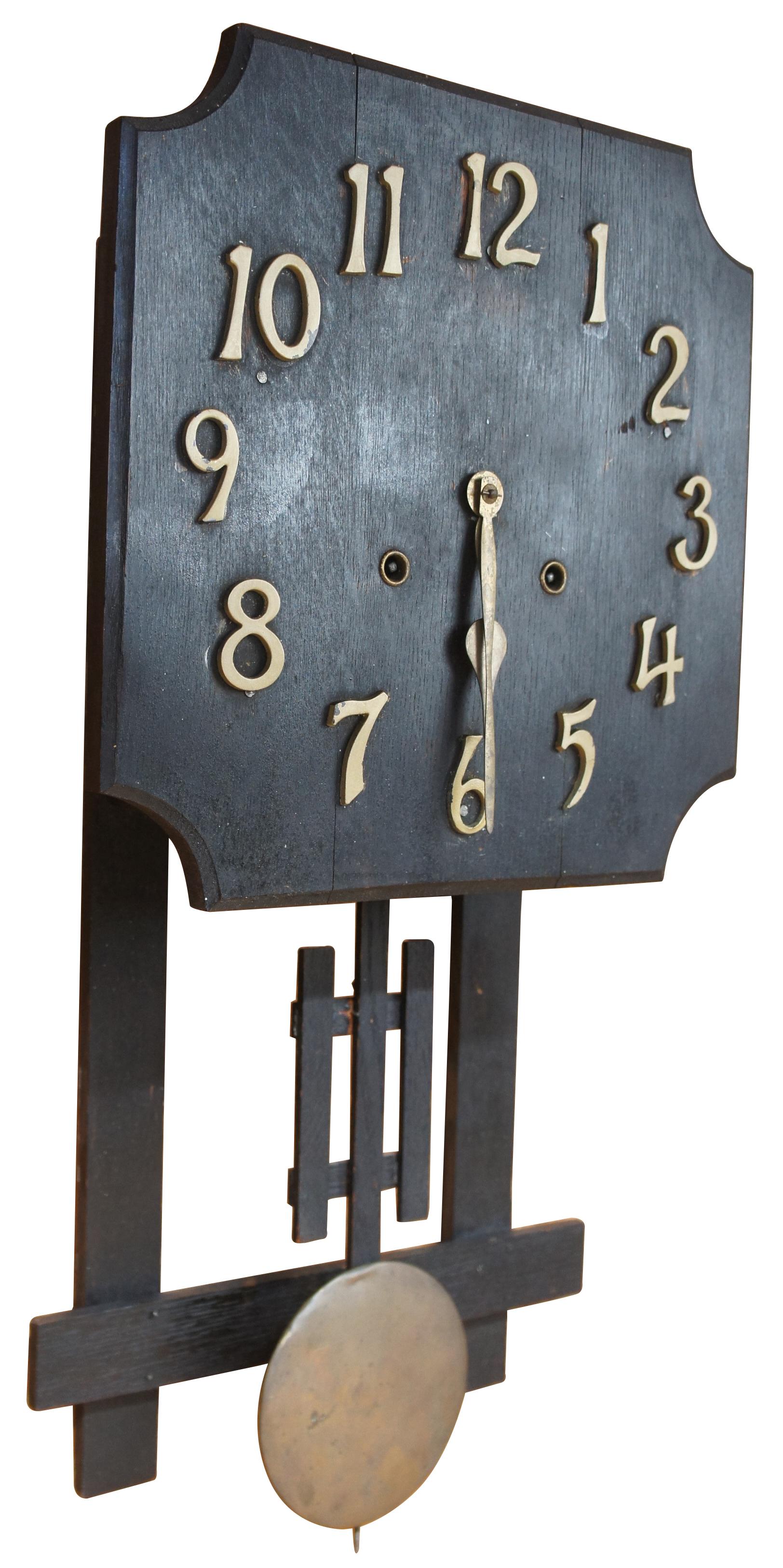 National clock co oak regulator clock. Made from oak with a black stain.