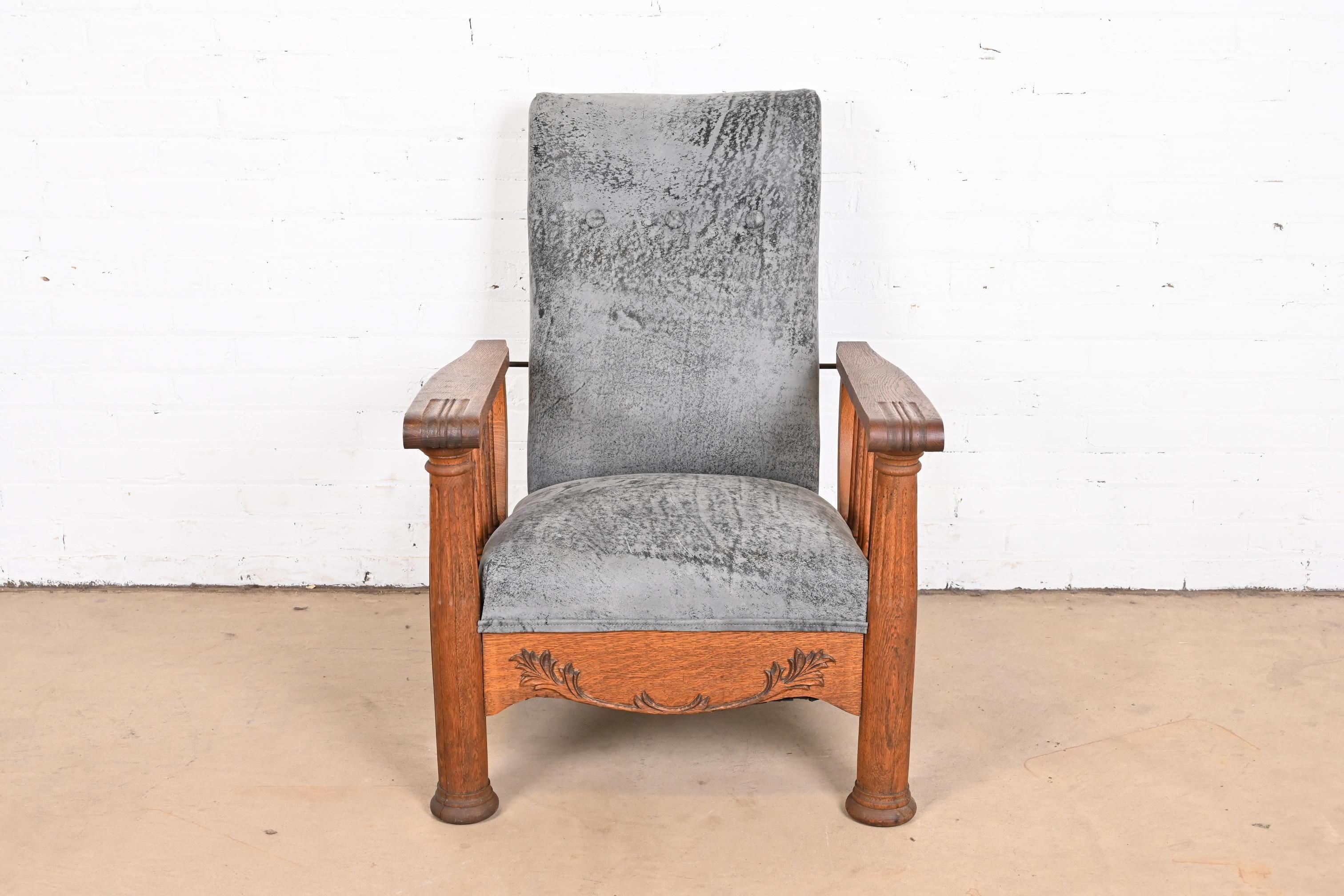 A gorgeous Mission or Arts & Crafts Morris reclining lounge chair

In the manner of Stickley

USA, Early 20th century

Carved oak frame, with newer intentionally distressed blue gray leather upholstery.

Measures: 28.5