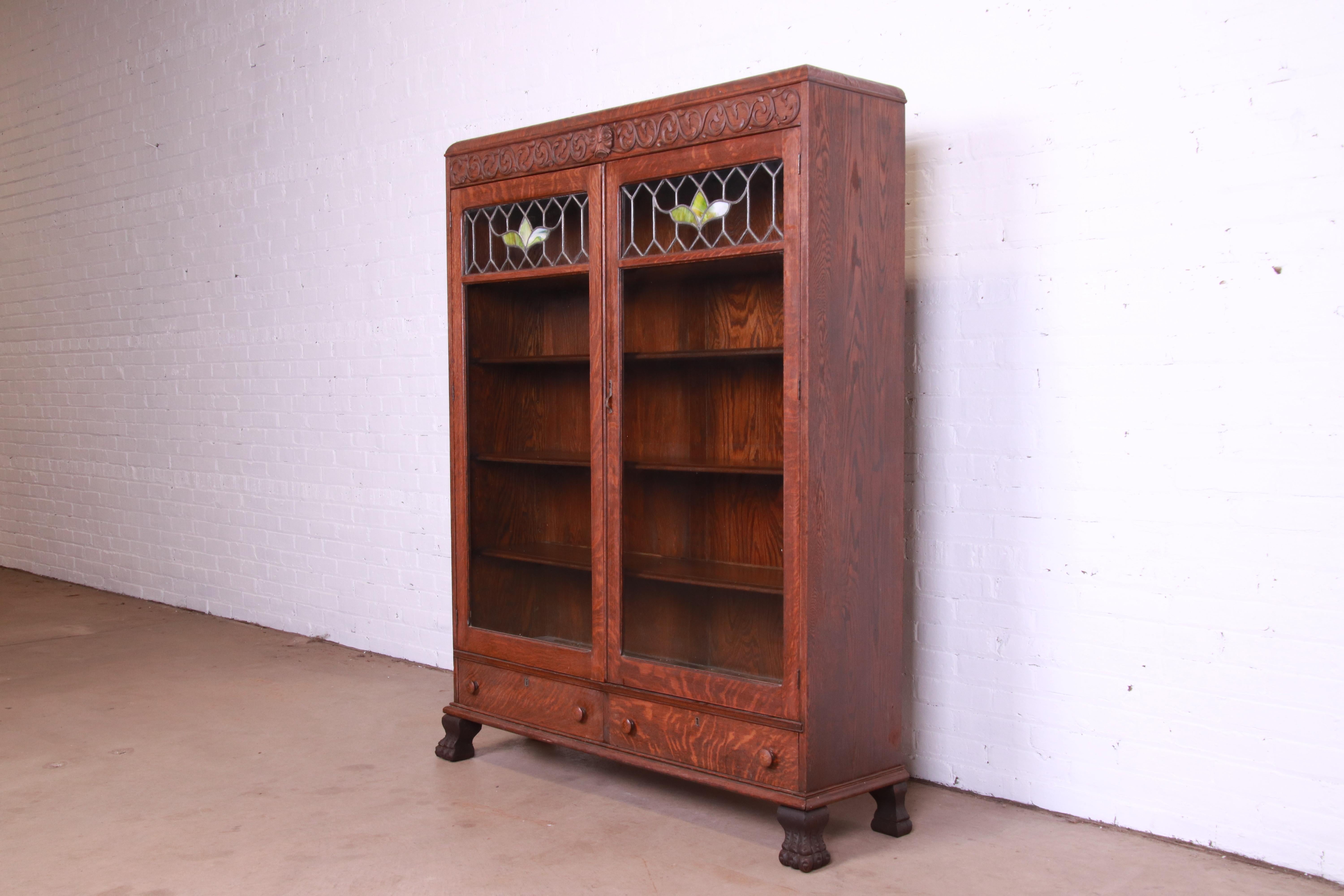 antique oak bookcase with leaded glass doors