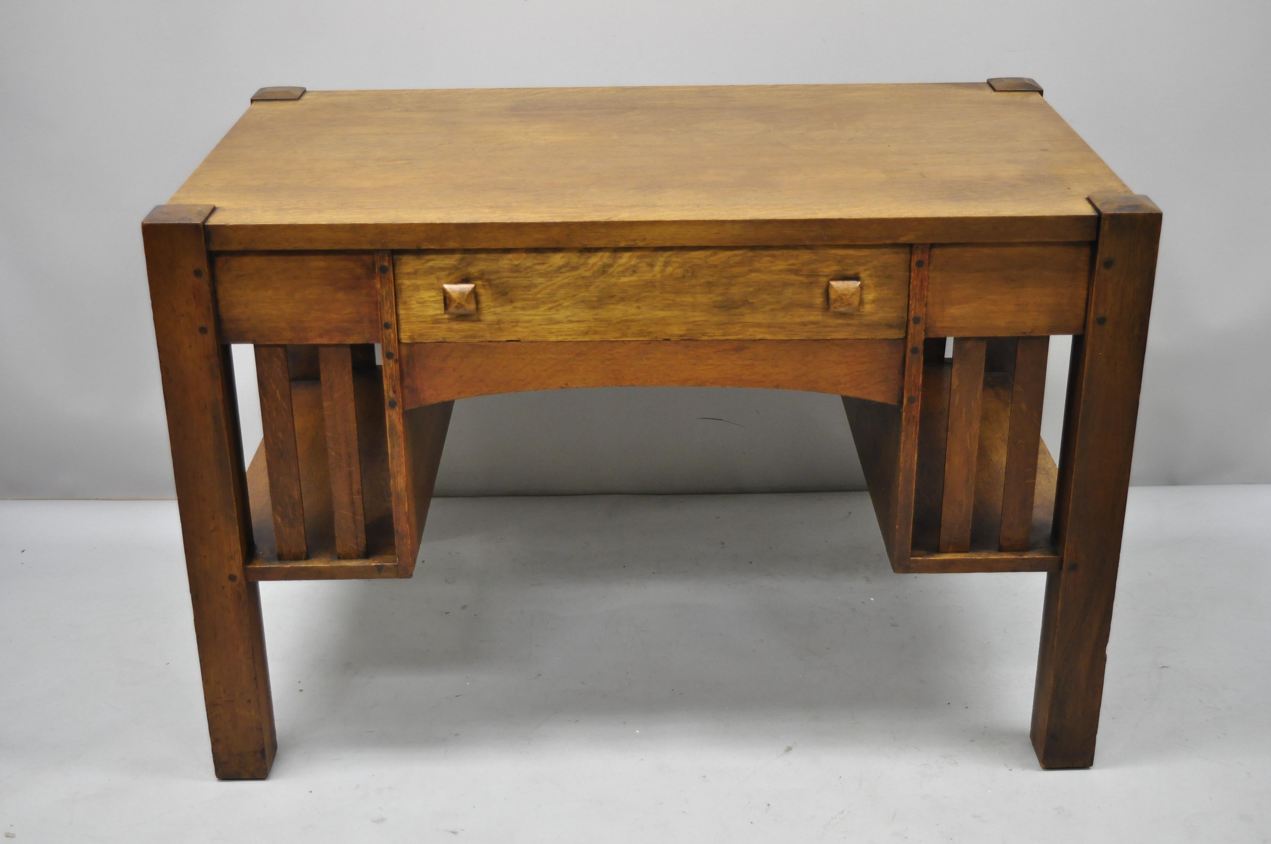 Antique Mission oak Arts & Crafts library desk table bookcase sides. Item features bookcase sides, exposed dowel joinery, solid wood construction, beautiful wood grain, finished back, 1 drawer, very nice antique item, circa 1900. Measurements: 30