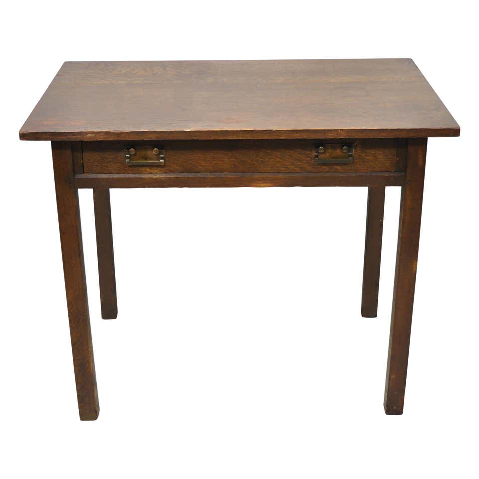 G M Ellwood, made by J S Henry An Arts and Crafts Oak Writing Desk For