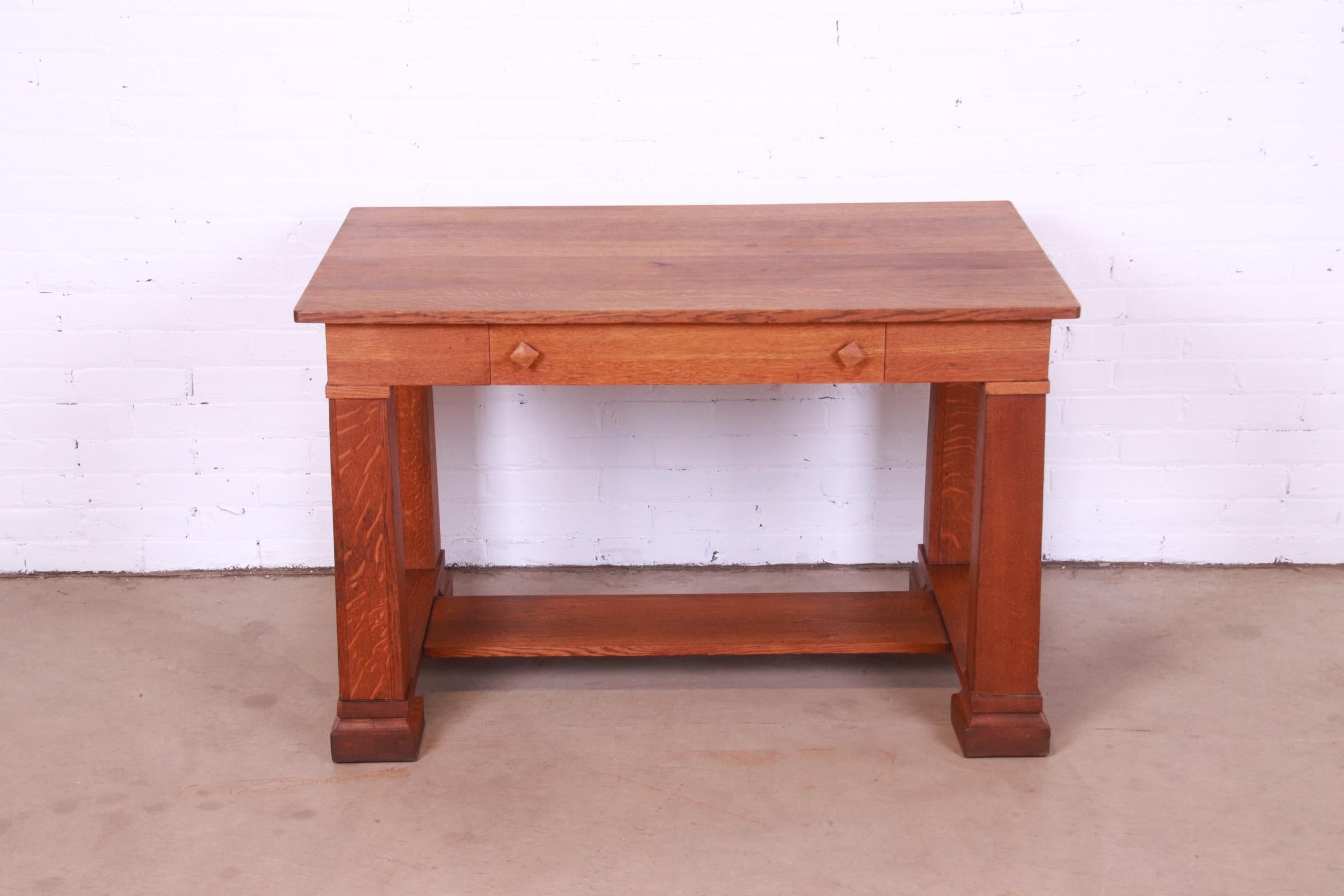 A beautiful antique Mission Arts & Crafts quarter sawn oak writing desk or library table

Recently procured from Frank Lloyd Wright's DeRhodes House

In the manner of Stickley

USA, Circa 1900

Measures: 45