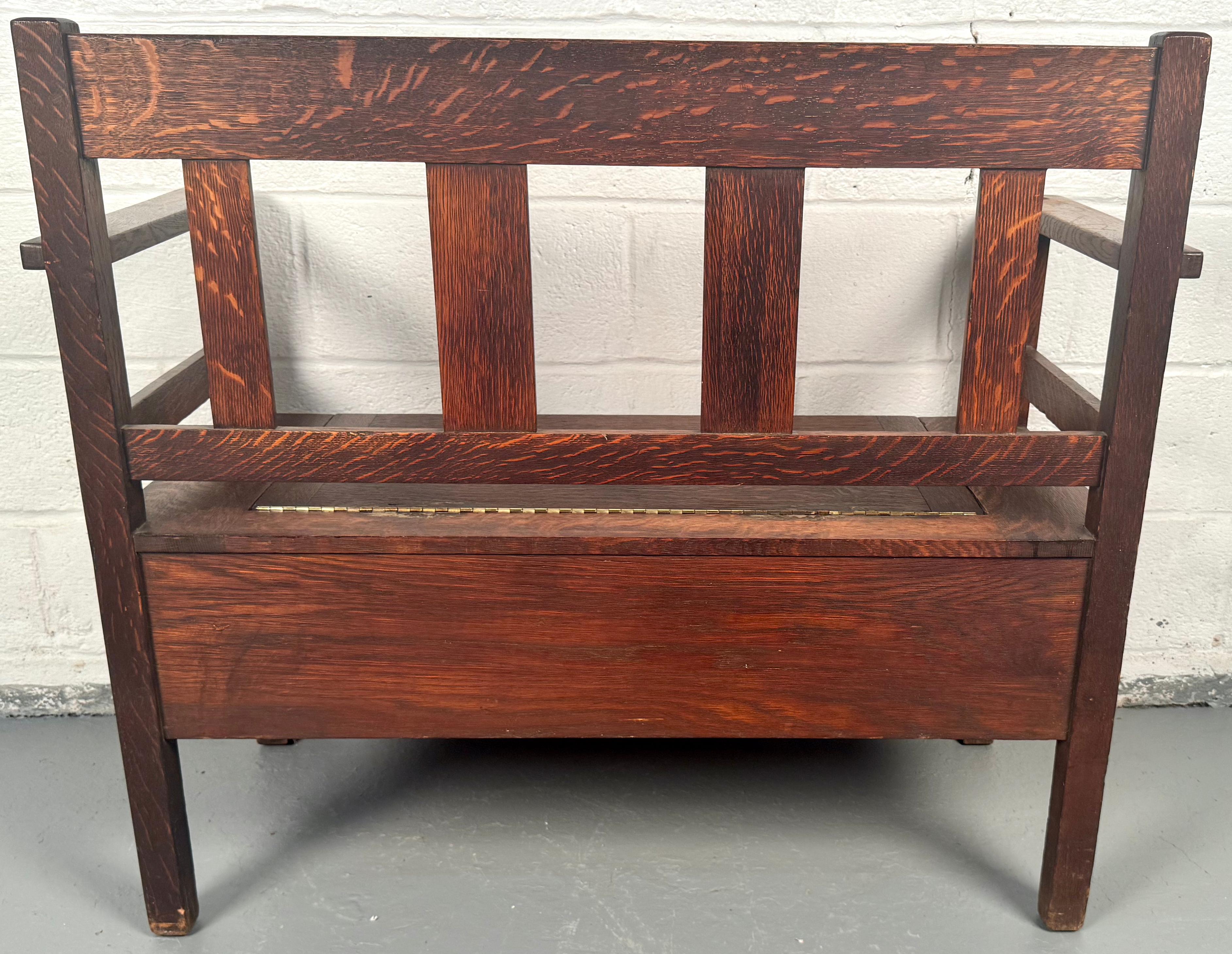 Bring classic craftsmanship and timeless style into your home with this antique Mission-style oak bench, crafted by the renowned Lifetime Furniture Company in the early 1900s. Perfect as a stylish hallway seat, window bench, or living room accent,
