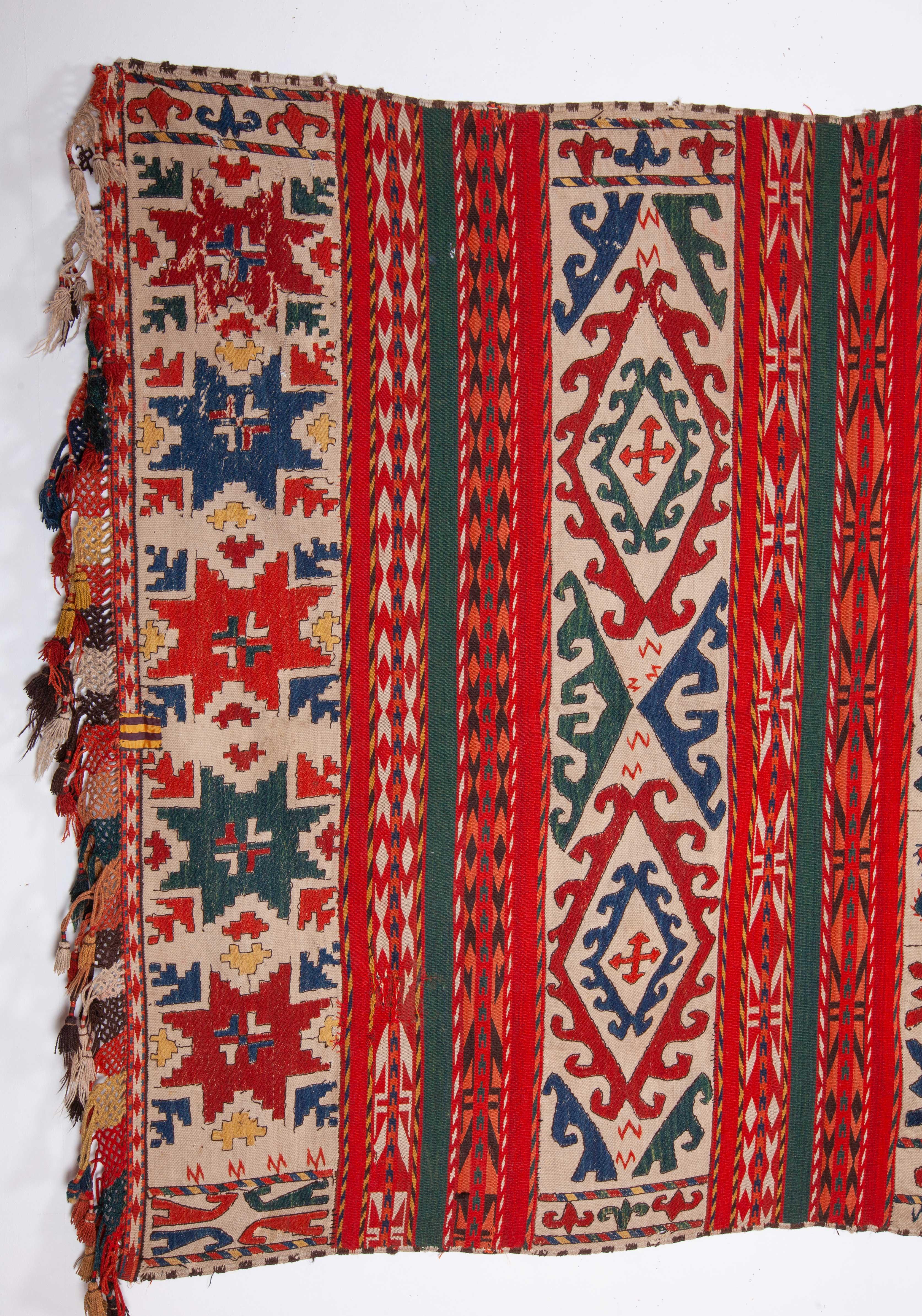 These kilims, from the region of Kungrad in Uzbekistan, are called 'Gyz Gilam' and they are mainly done in two different techniques: warp faced jajim and embroidered.
  