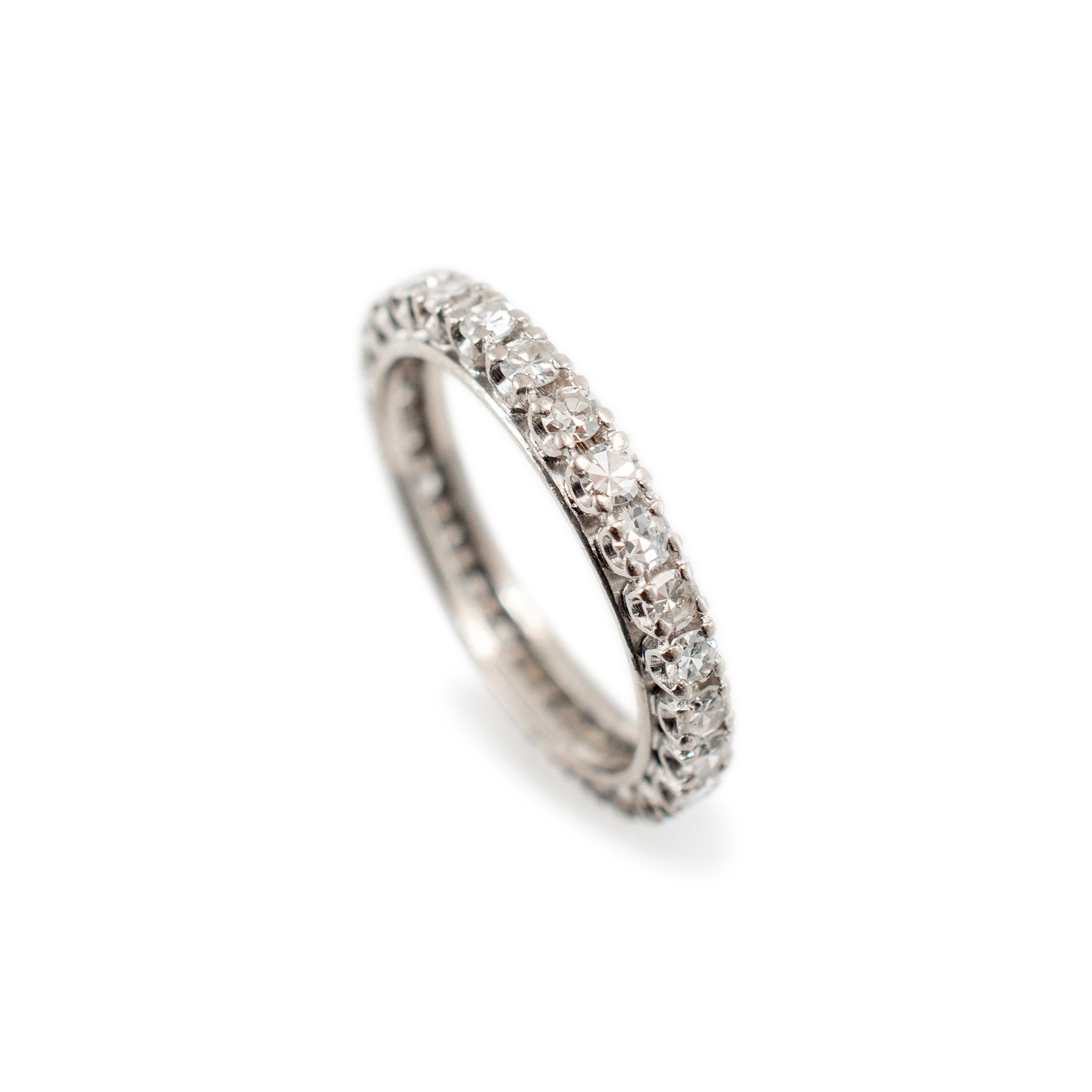 Gender: Ladies 

Metal Type: Palladium, 800 Silver & 9K White Gold

Ring Size: 6 

Width: 3.20 mm

Weight: 2.48 grams

One ladies palladium silver and white gold diamond antique wedding eternity band with a soft-square shank. The metals were tested