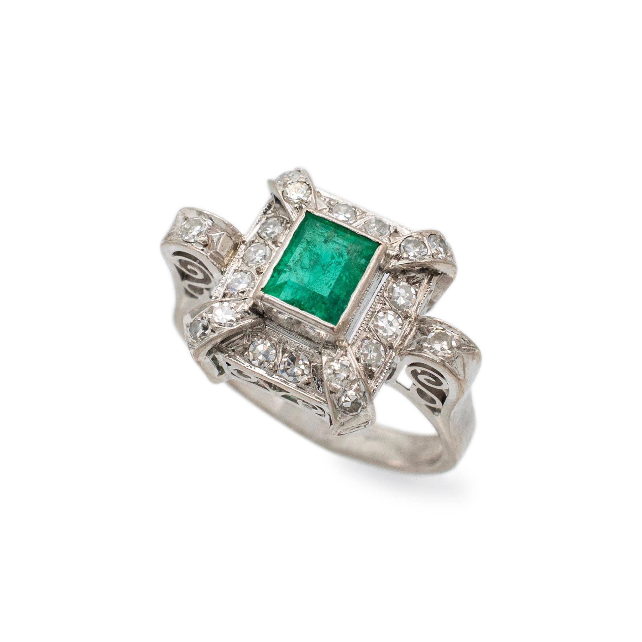 Gender: Ladies

Ring Size: 6

Metal Types: Gold, Silver and Palladium

Weight: 4.15 grams

Ladies handmade filigreed palladium, silver and yellow gold, diamond and emerald antique cocktail ring with a half round shank. The metals were tested and