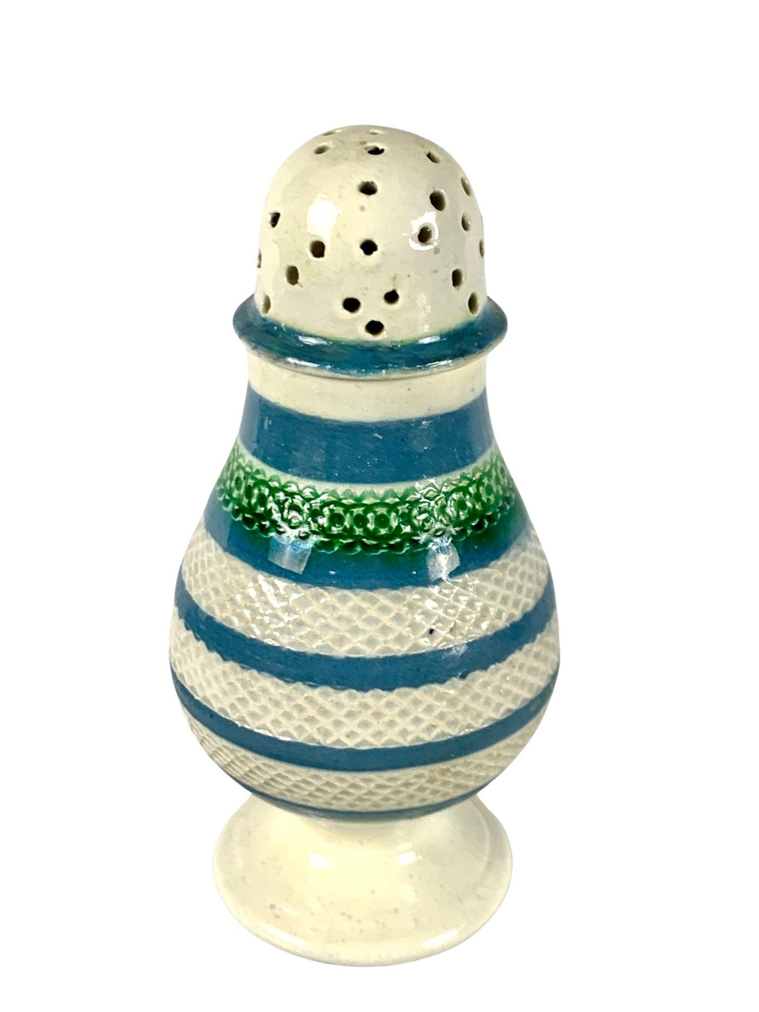 This mochaware saltshaker has an attractive design with four bands of intricate 