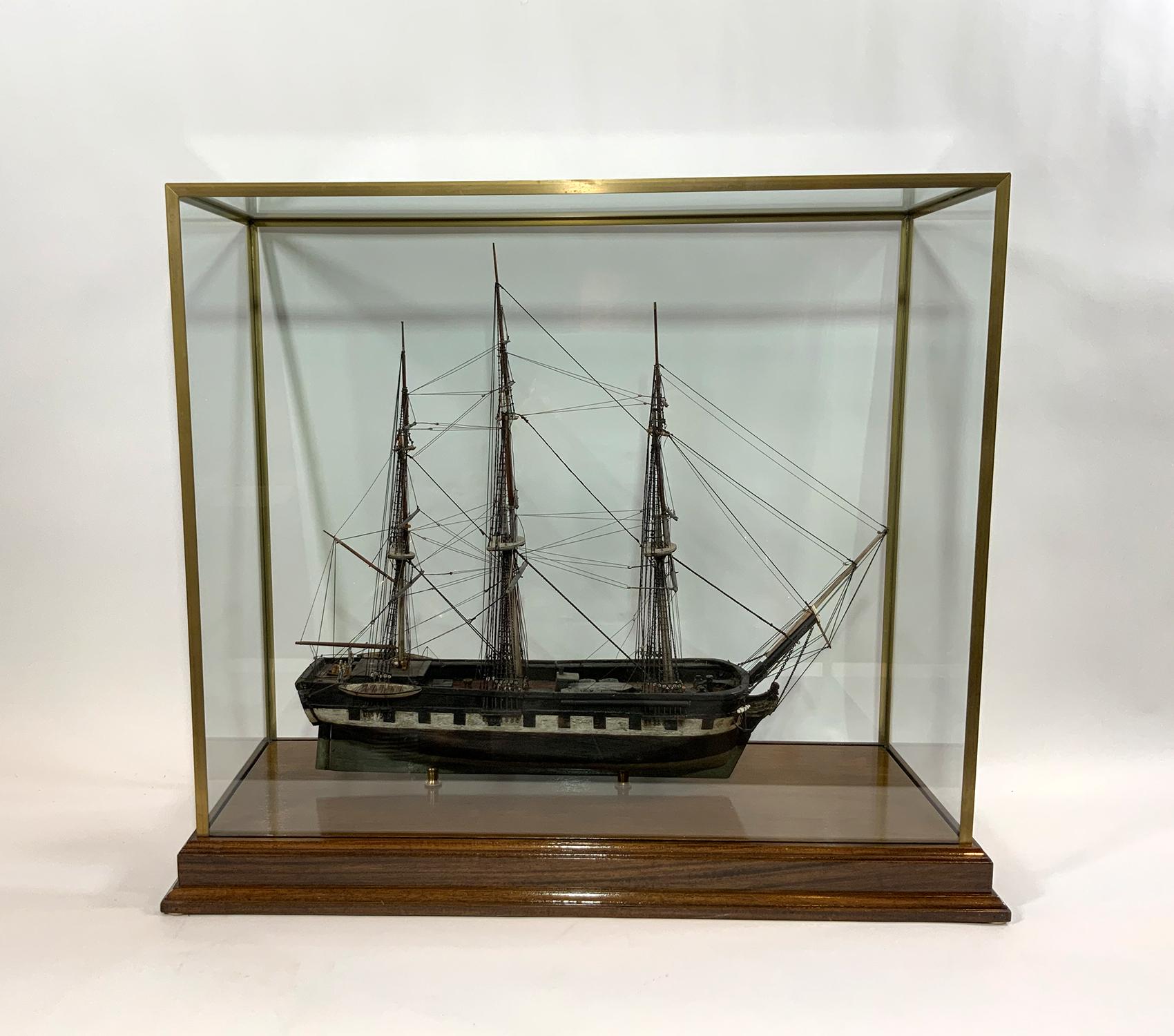 This is a well-preserved model dating to the early 1900’s. in original paint. Vessel name is painted on the stern. Fully rigged with all appropriate cords. Mounted into a custom display case.

Weight: 41 LBS
Overall Dimensions: 28” H x 33