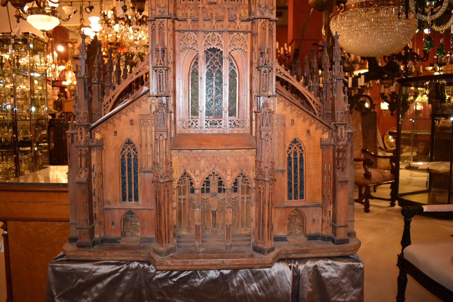 Stunning and rare scale model of the Ulm Cathedral, completed in 1925 by Michael Molz of Los Angeles. It is in remarkably good condition and features stained glass windows. 
The Ulm Minster is located in Ulm, Germany and at this time is the tallest