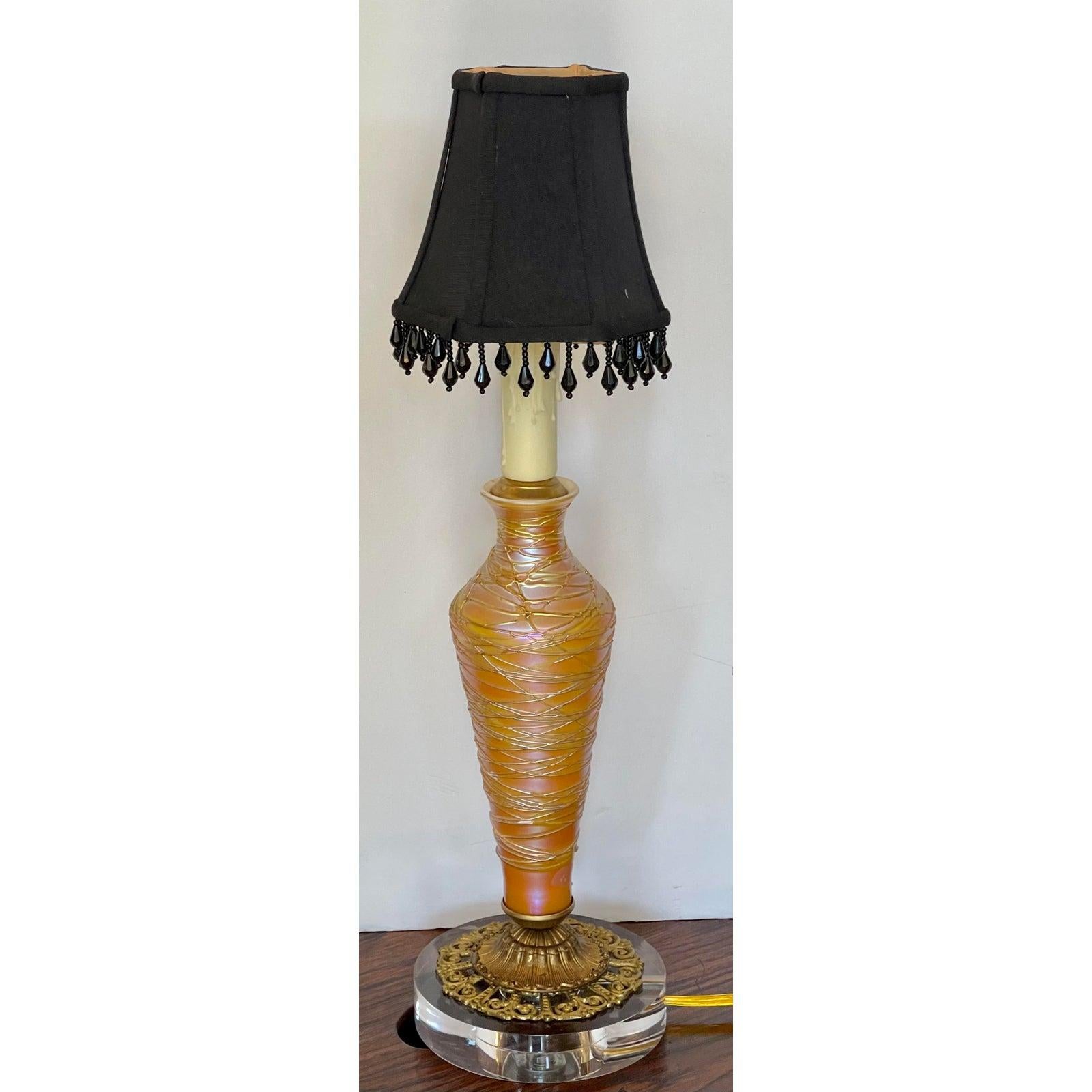 Antique Modernized Durand Threaded Glass Table Lamp

Additional information:
Materials: Glass
Color: Orange
Brand: Durand
Designer: Durand
Period: Early 20th Century
Styles: Art Deco, Modern
Lamp Shade: Included
Item Type: Vintage, Antique or