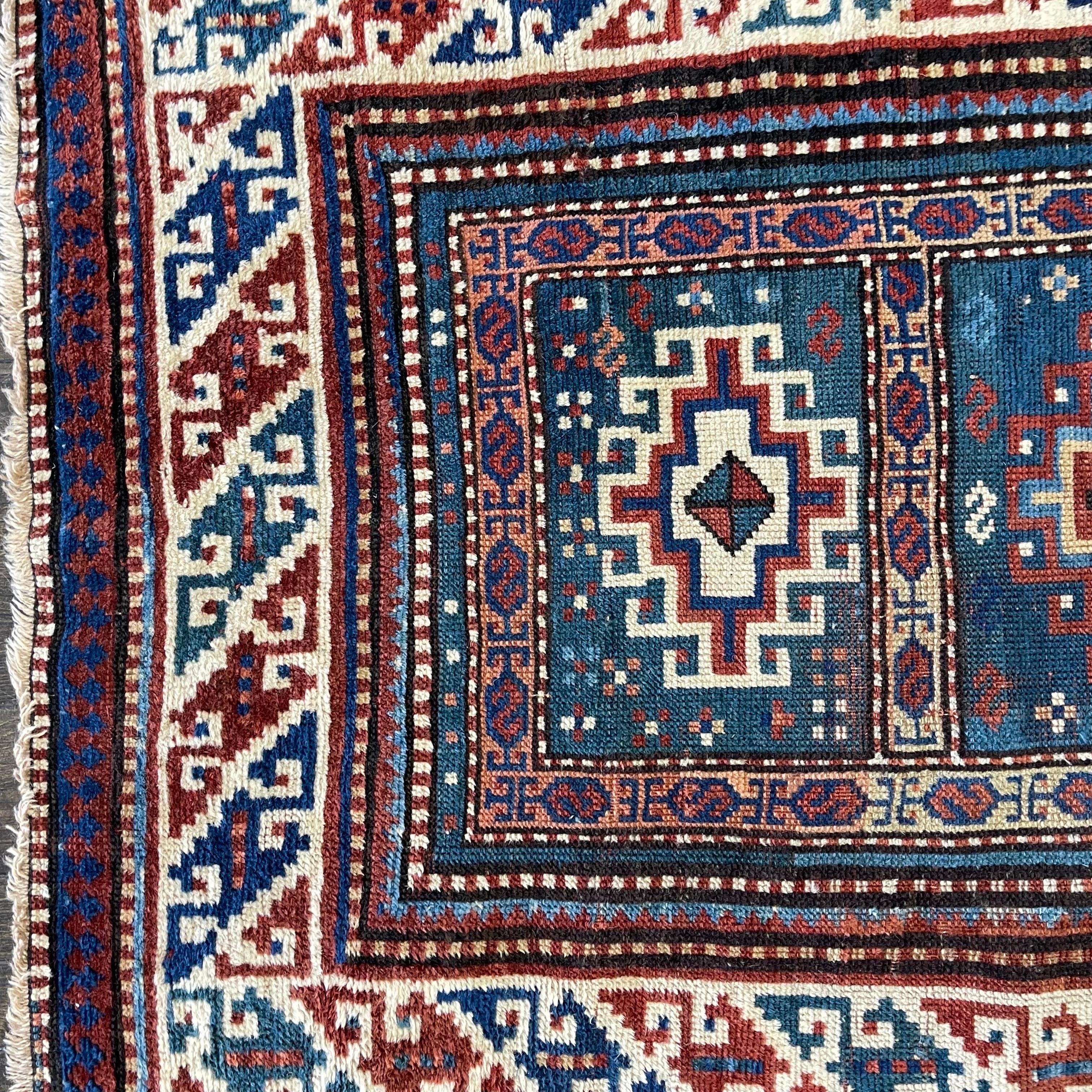 Wool Antique Moghan Kazak circa 1910 For Sale