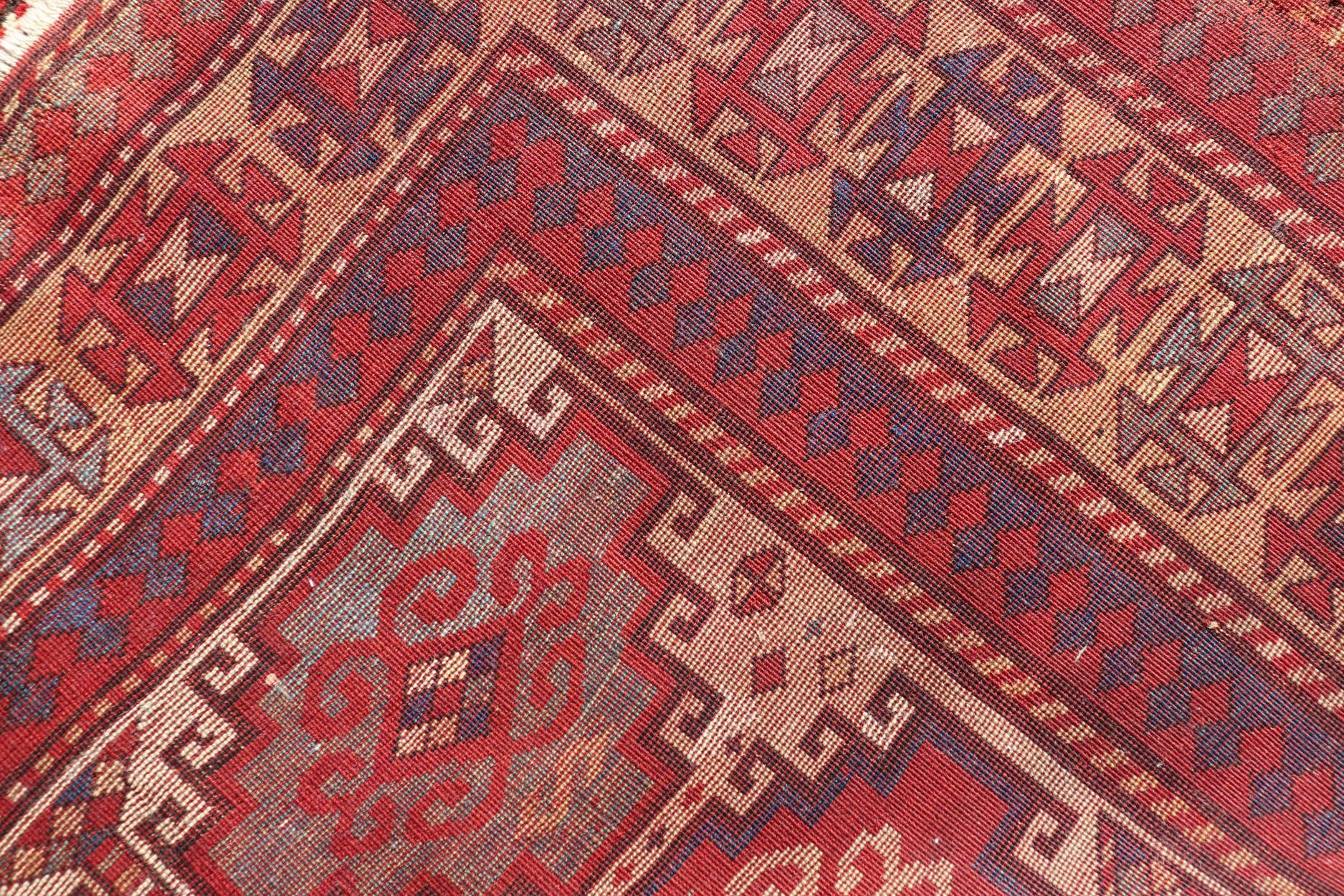 Wool Antique Moghan Kazak Rug Showcasing Bold Geometric Medallions 4'6 x 6' For Sale