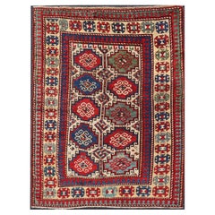 Antique Moghan Kazak Rug Showcasing Bold Geometric Medallions 4'6 x 6'