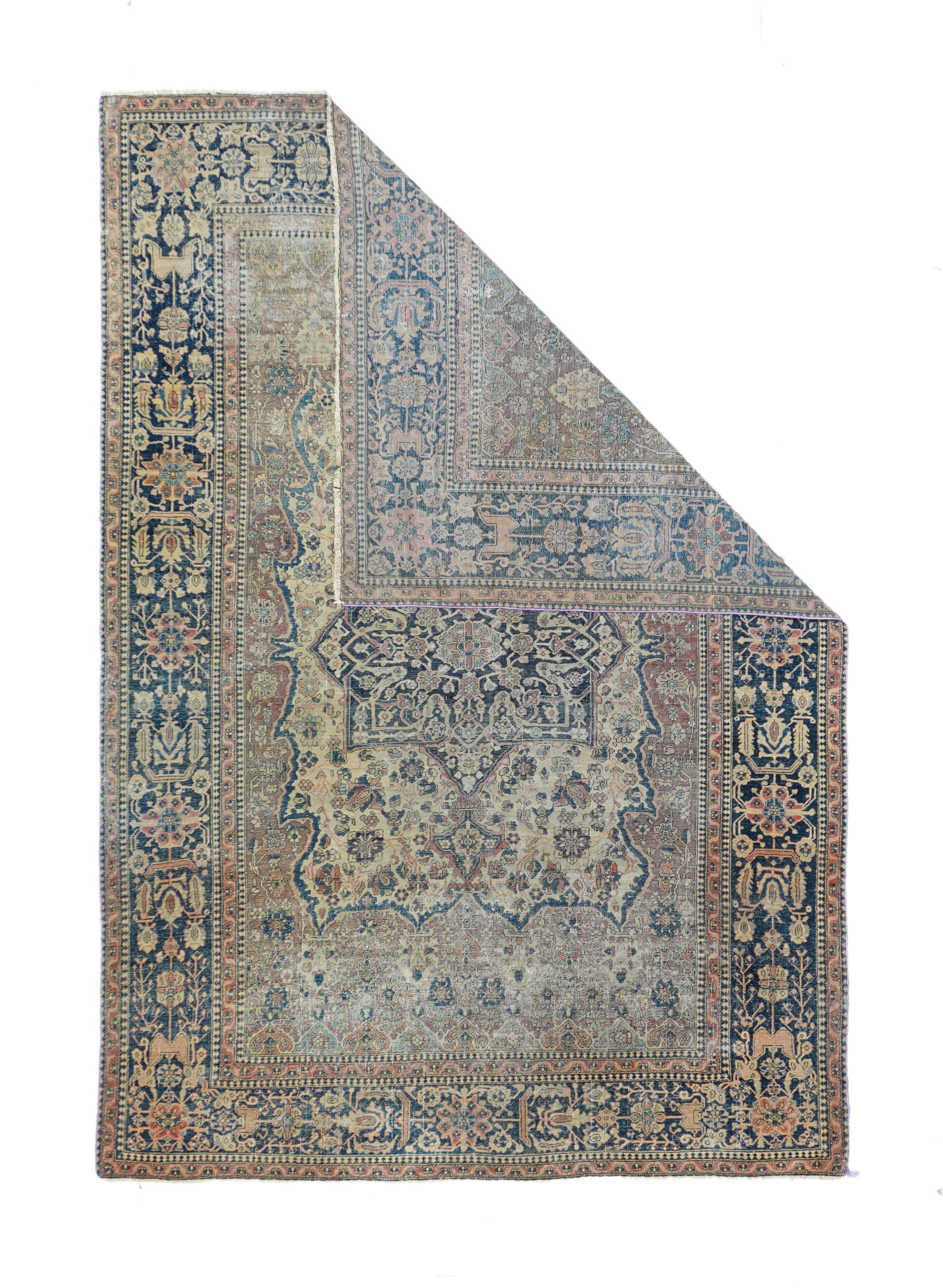 Although in only fair condition with wear abrash, this central Persian, finely woven, town scatter still possesses real character. The rust red field with an allover flower pattern supports a rectangular ivory subfield with a curvilinear bracket