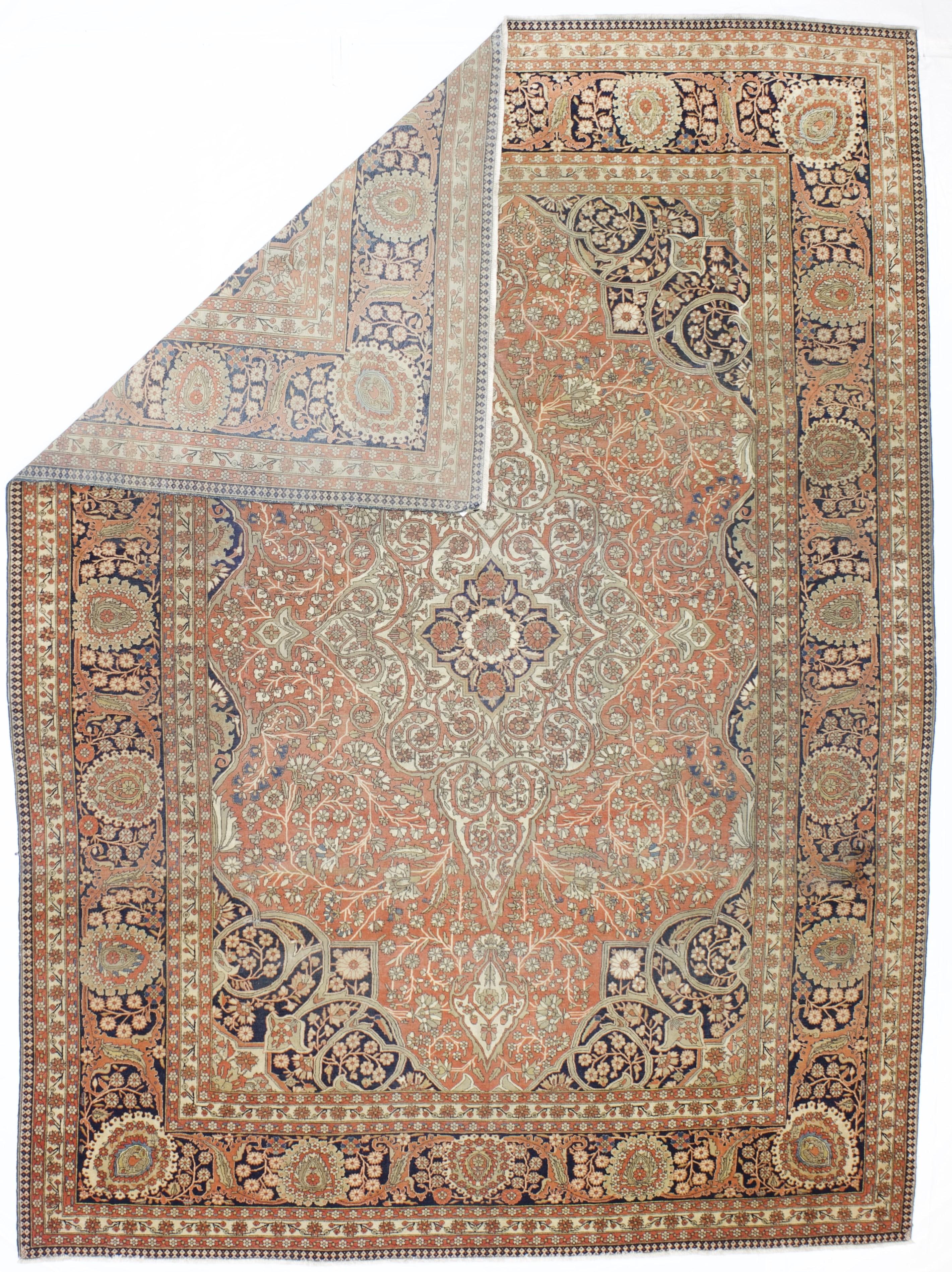 Antiker Mohtasham Kashan Teppich 8'4'' x 11'4''. Ein hohes Rautenmedaillon mit leicht konkavem Rand ist mit gegabelten Voluten verziert und trägt Wappenanhänger, alles auf korallenrotem Feld mit Voluten und mäandrierenden, blühenden Ranken.