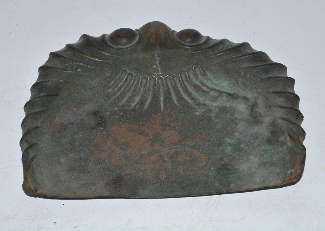 The antique copper dust pan or crumber has a molded flared design with two 