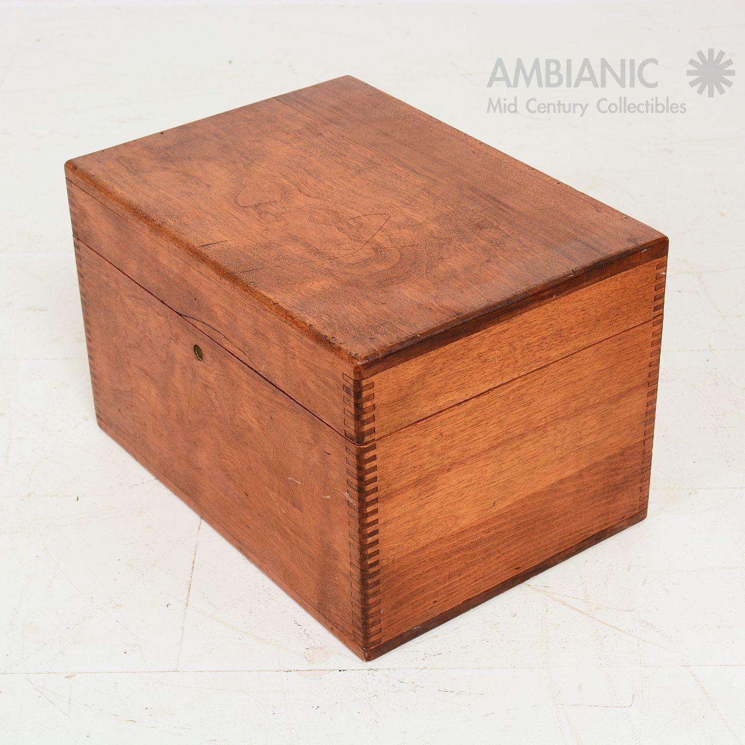 An antique coin cash money box with multiple storage compartments in the drawer tray. Solid maple wood. Constructed with box joints in the corner. No original key  is available.
Dimensions: 14