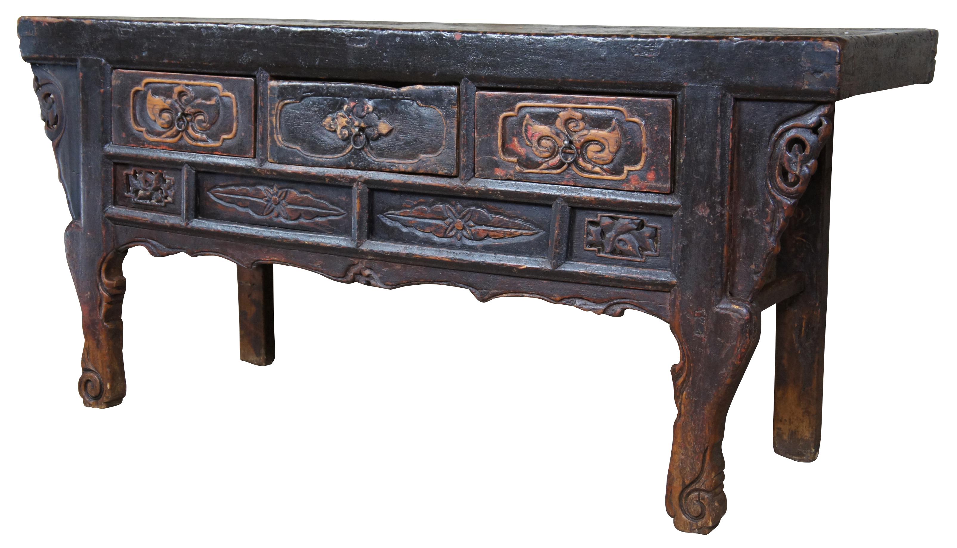 Ming inspired Altar coffer or console table, circa 1850s. Hand carved with a lacquered leather like upper surface. Features 3 drawers for storage and an open area underneath. Measure: 71