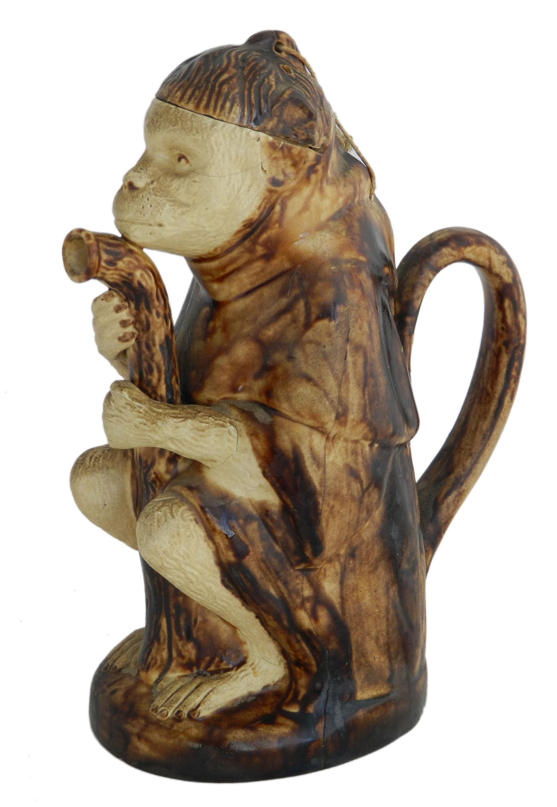 Antique Monkey Pitcher or Jar by Bodlet Vaudancourt 1840
Very rare pottery from France 
Very good Antique Condition with minor marks to the neck as shown
Vaudancourt is in Marne with connection to Sevres





  