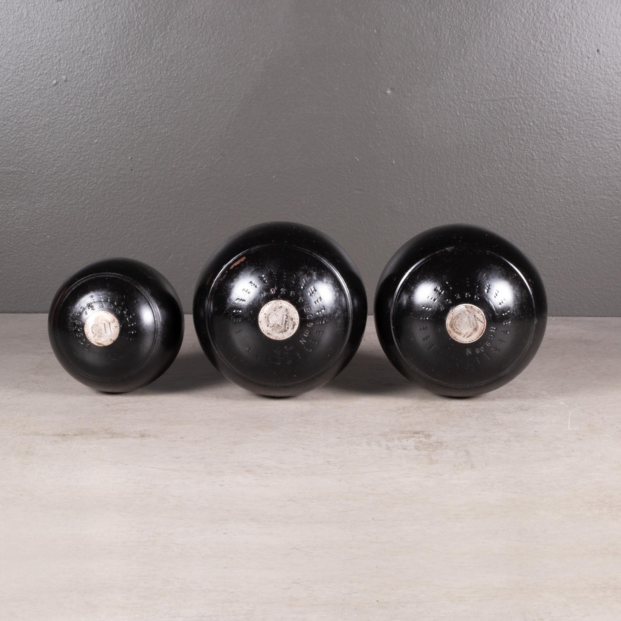 ABOUT

A set of English lawn bowls made of Lignum Vitae Wood inlaid with sterling silver. Monogrammed 