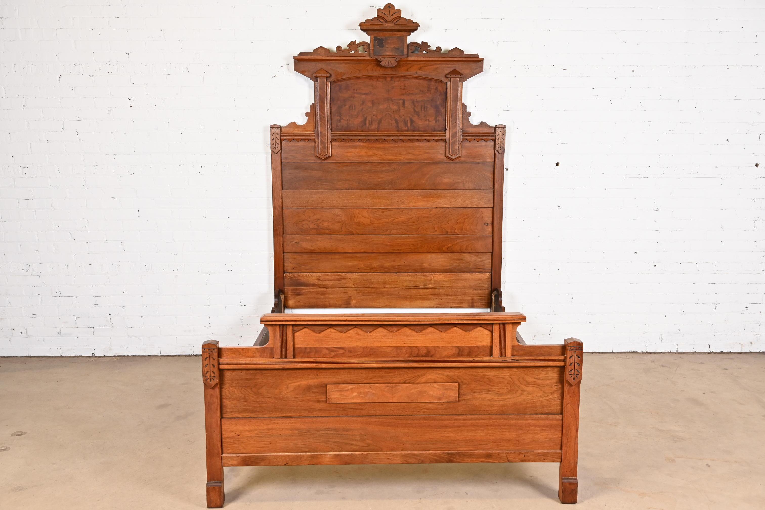 American Antique Monumental Eastlake Victorian Carved Burled Walnut Full Size Bed, 1880s For Sale