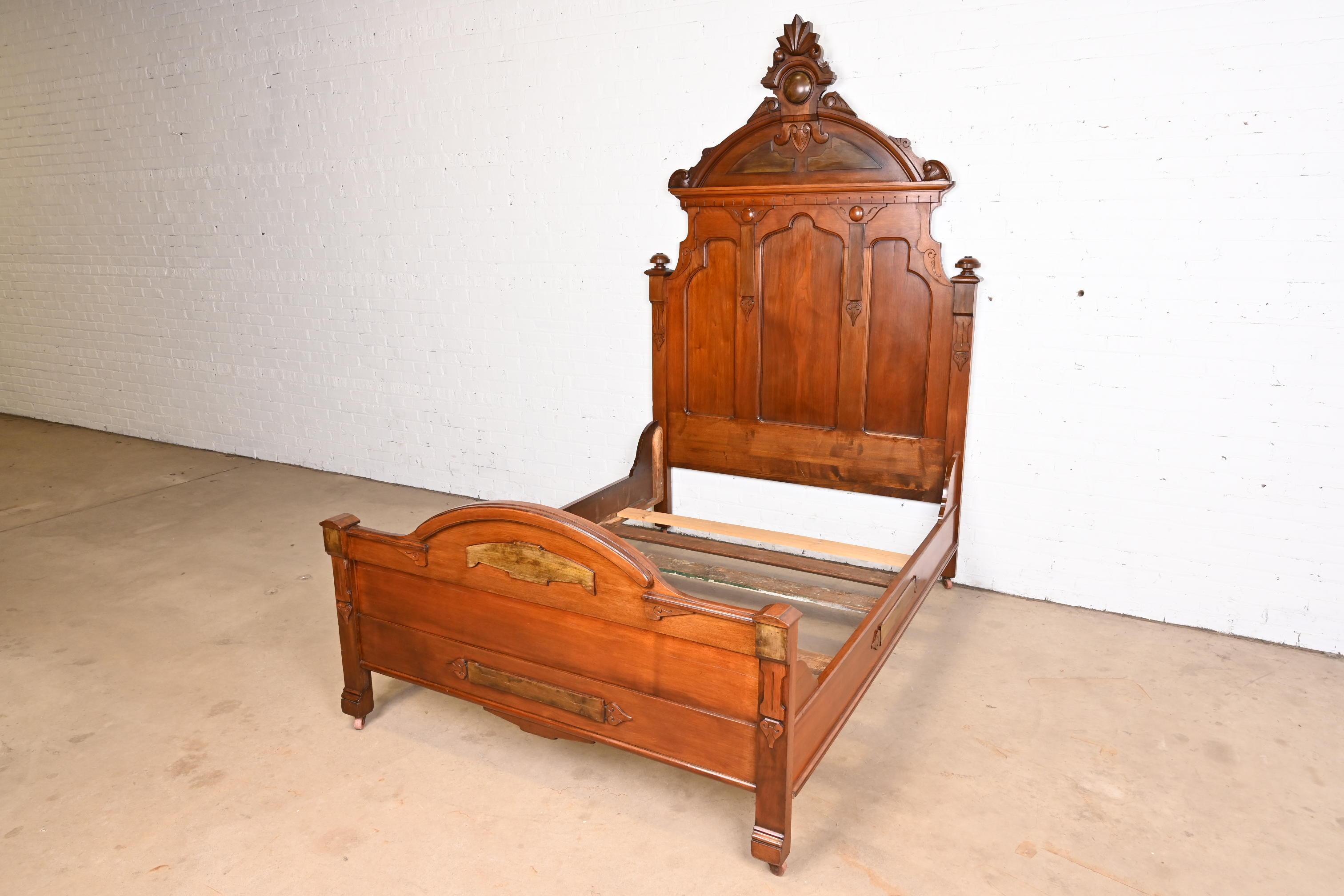 American Antique Monumental Eastlake Victorian Carved Walnut Full Size Bed, Circa 1880s