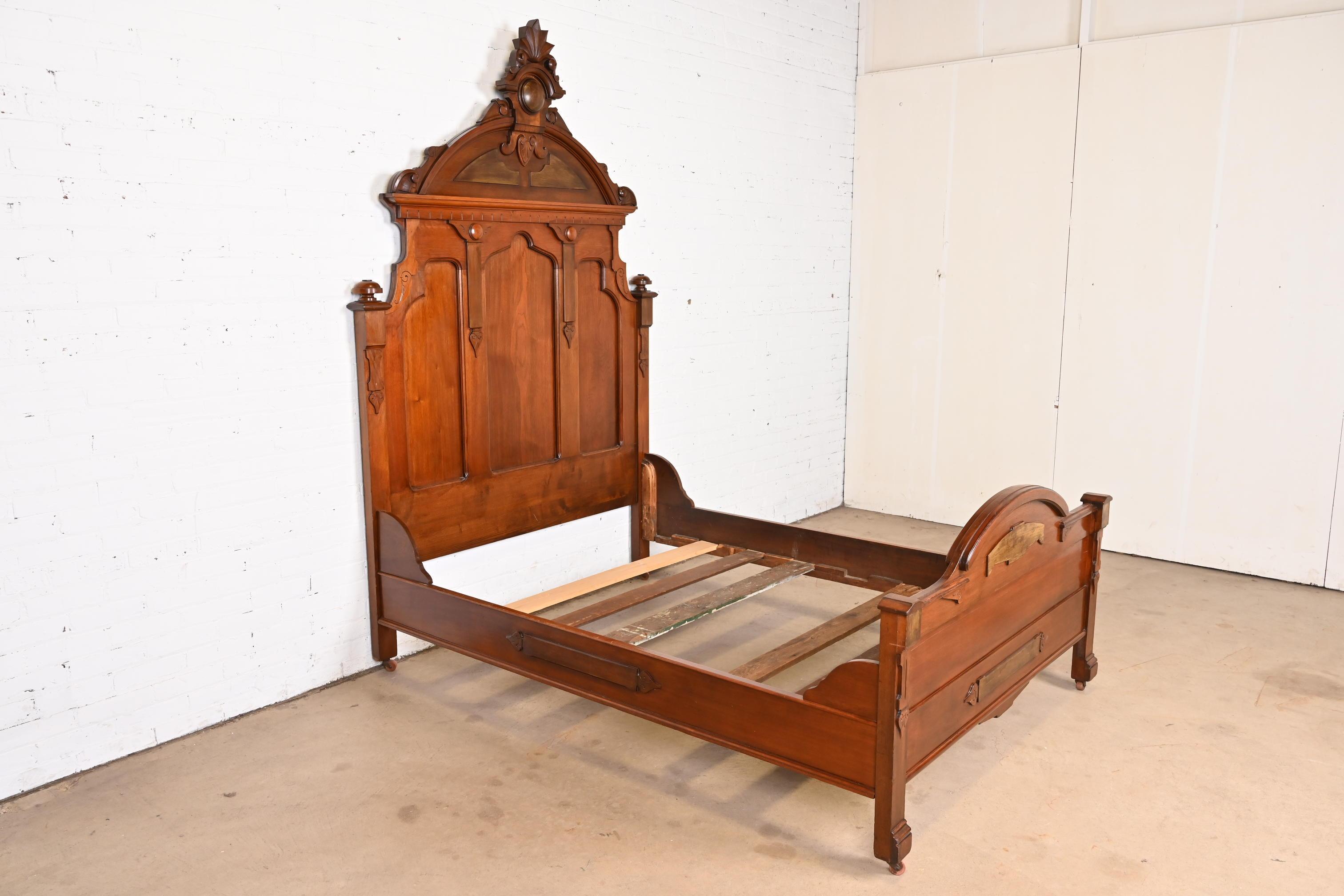 Antique Monumental Eastlake Victorian Carved Walnut Full Size Bed, Circa 1880s In Good Condition In South Bend, IN