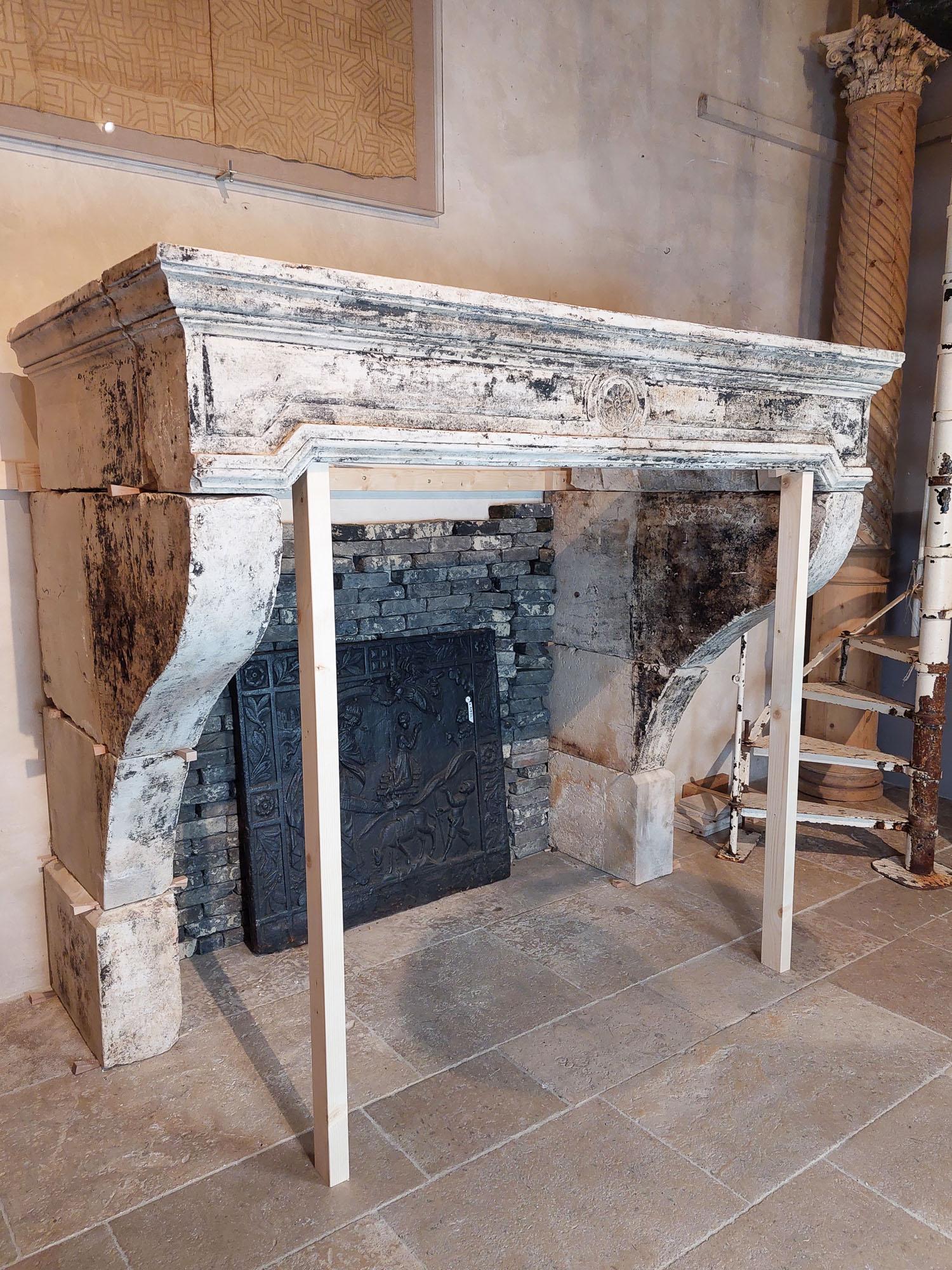 18th Century and Earlier Antique Monumental French limestone Castle Mantelpiece For Sale
