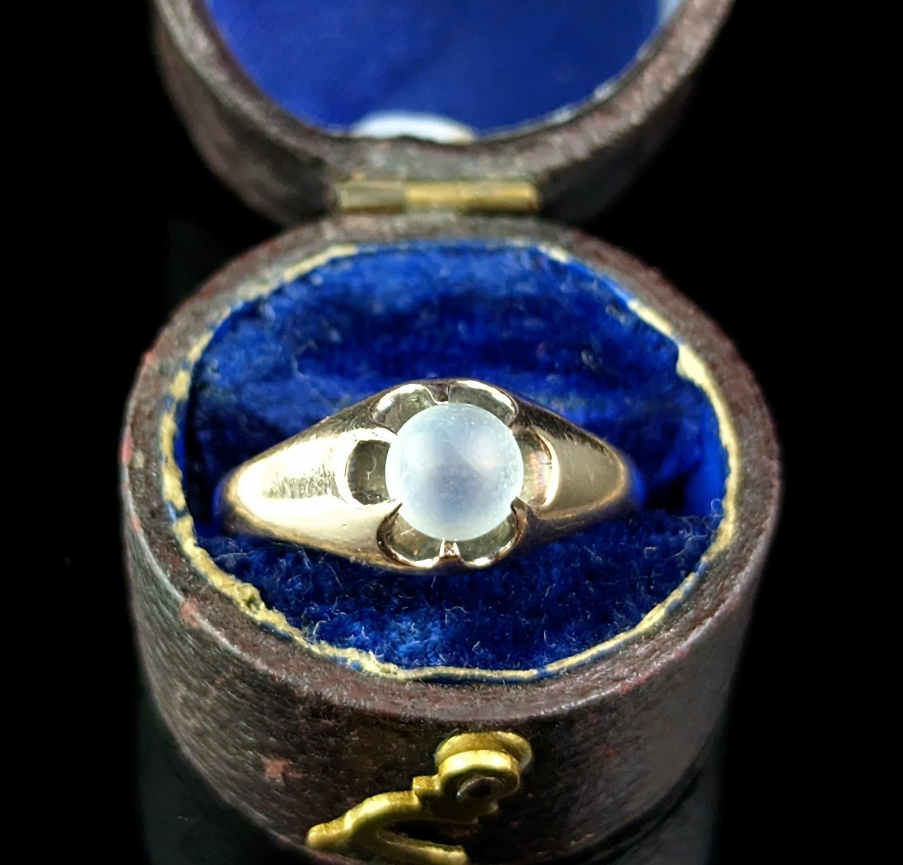 Such a magic and mystical antique moonstone ring!

This ring is like wearing a little crystal ball on your hand, the moonstone is a complete sphere and it rolls smoothly within the setting which gives it a very interesting angle.

The moonstone