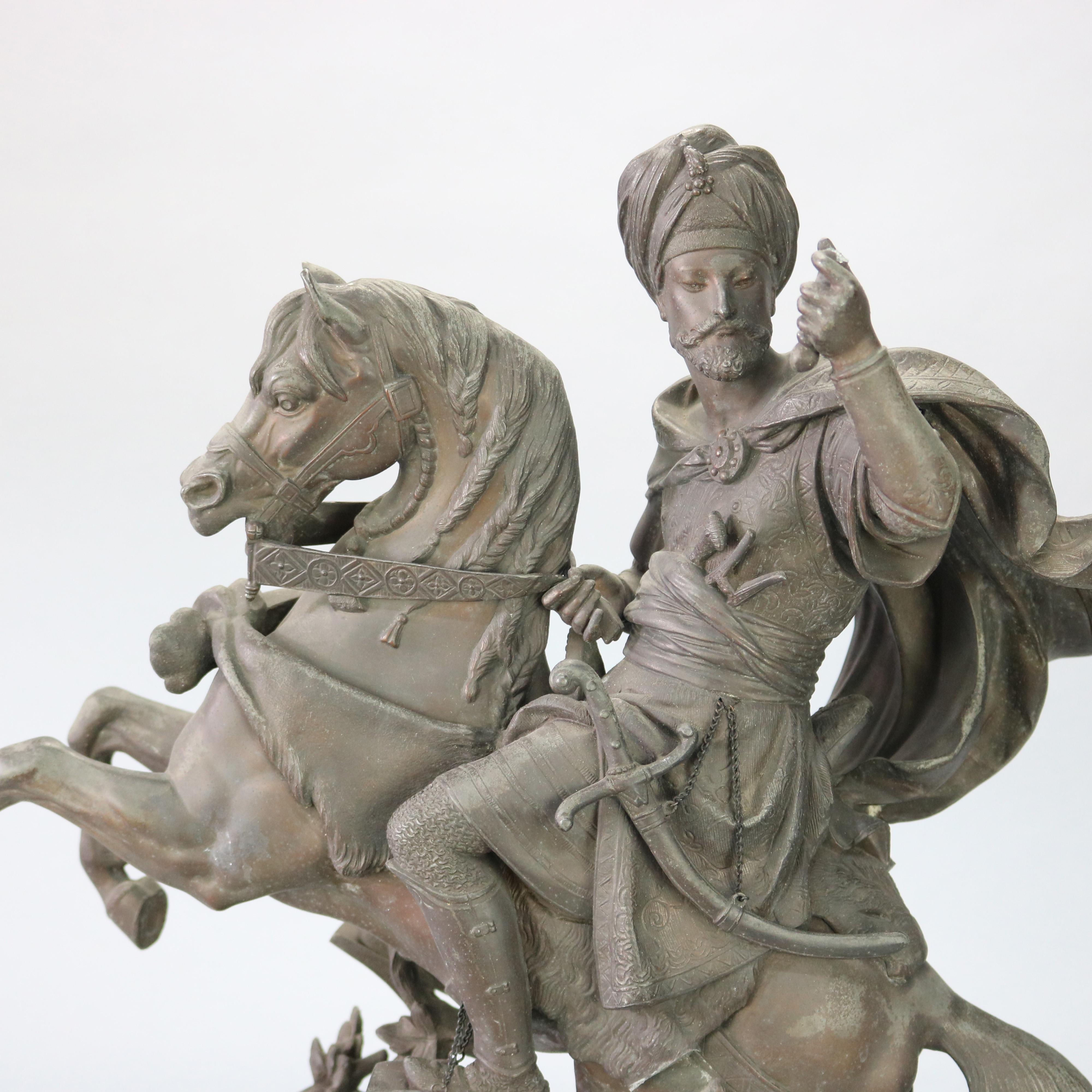 An antique Moorish bronzed cast metal sculpture depicts Haroun Al Rashid on horseback, signed A. Carrier on wood plinth, 19th century

Measures: 24