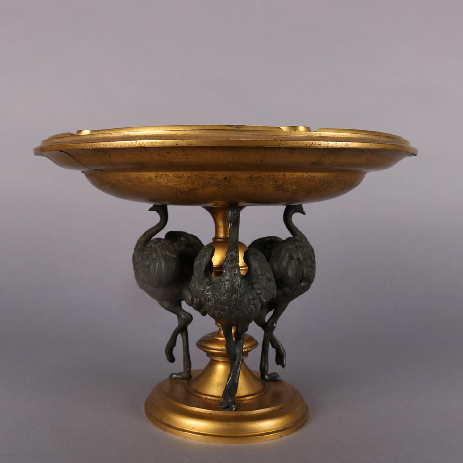 Antique Moorish gilt metal figural compote features bowl with enameled geometric decoration and supported by three cast emus, circa 1890.

Measures: 9.25