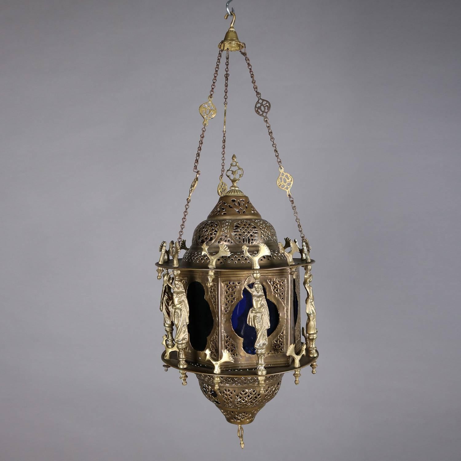 Antique Moorish hanging lantern features reticulated frame with figural supports of partial nude female figures with water vessels and alternating figural stylized birds/chickens, glass is cobalt blue, Persian, Moroccan, Turkish, not electrified,