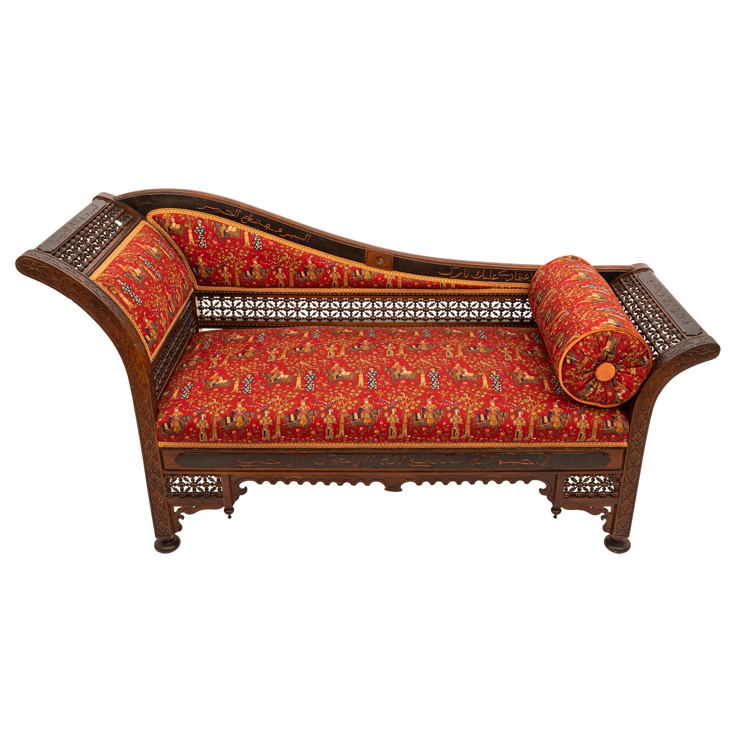 An elegant antique Arabesque chaise longue sofa, circa 1880.
The sofa in the Moorish style and most likely made in Syria or another country in the Levant, in the last quarter of the 19th century. The chaise has just been professionally