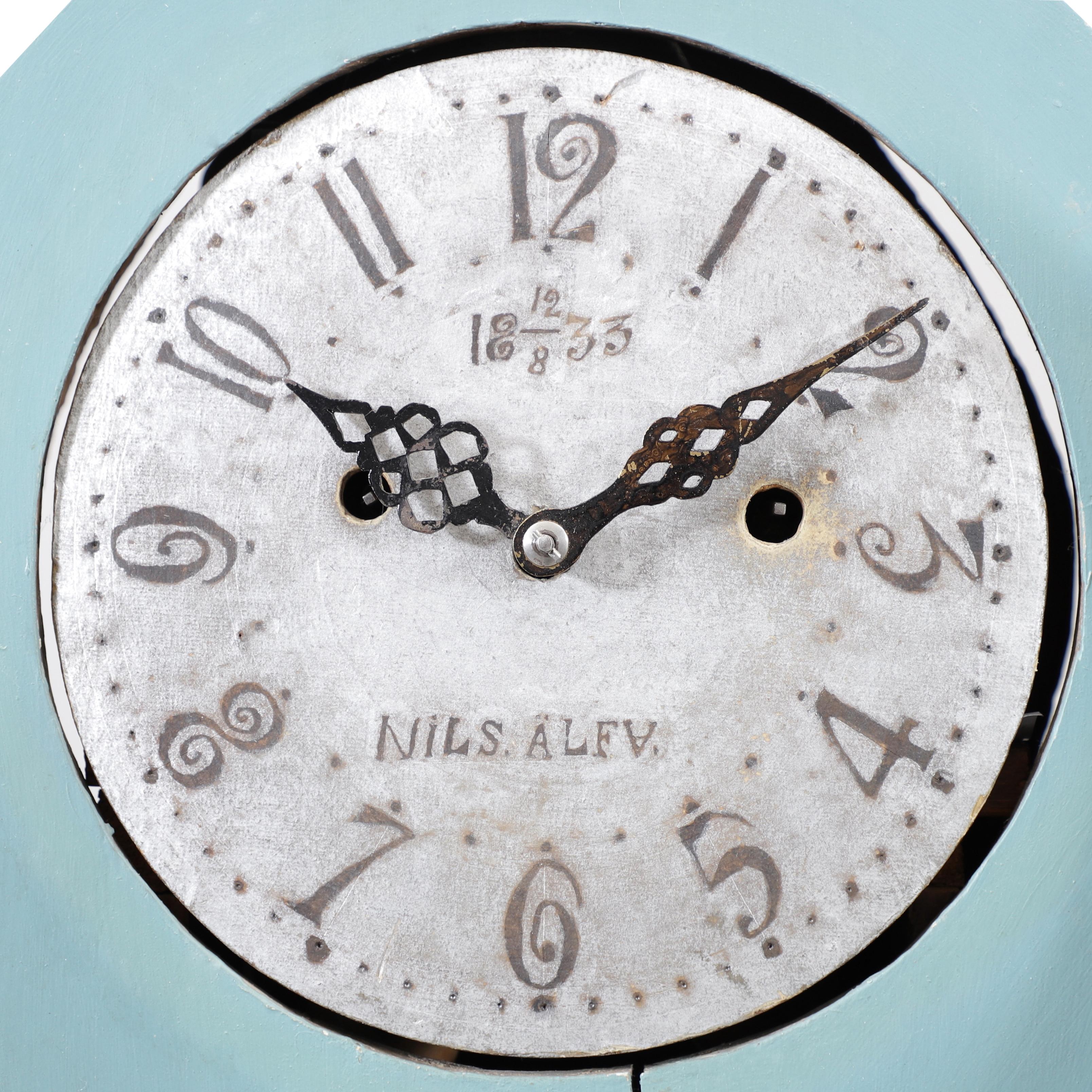 Antique Swedish Mora clock in blue with hand painted details. Working Longcase clock mechanism of pendulum and 2 weights and a bell chime on the hour.

Width: 60cm / 23.6