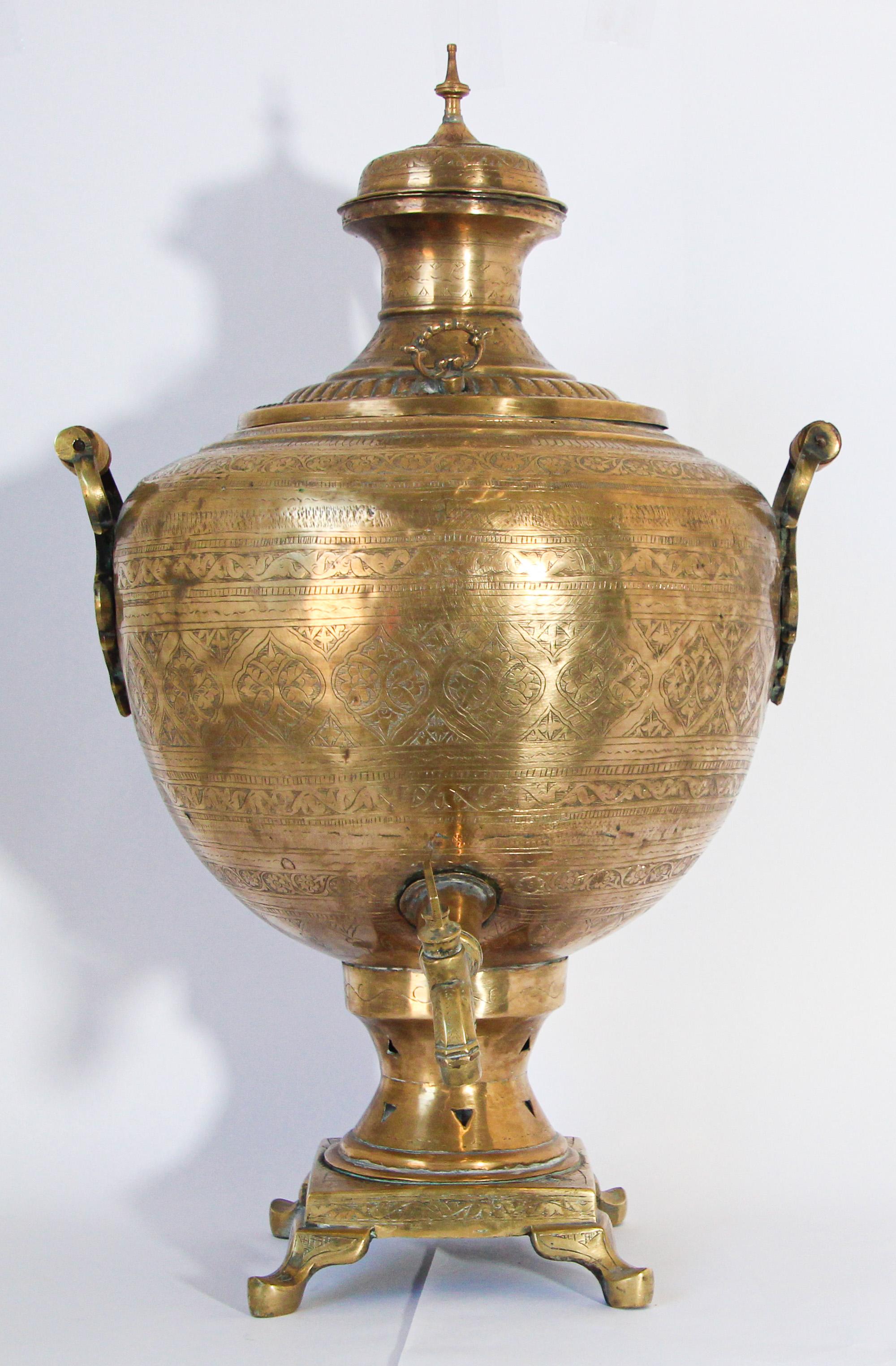 Exceptional large scale handcrafted  Mughal Indian brass samovar, tea kettle with finely etched and embossed floral designs.
Used in the Middle East, Indian, Turkey, Asia and North Africa, Morocco to boil water for tea or coffee.
Islamic style