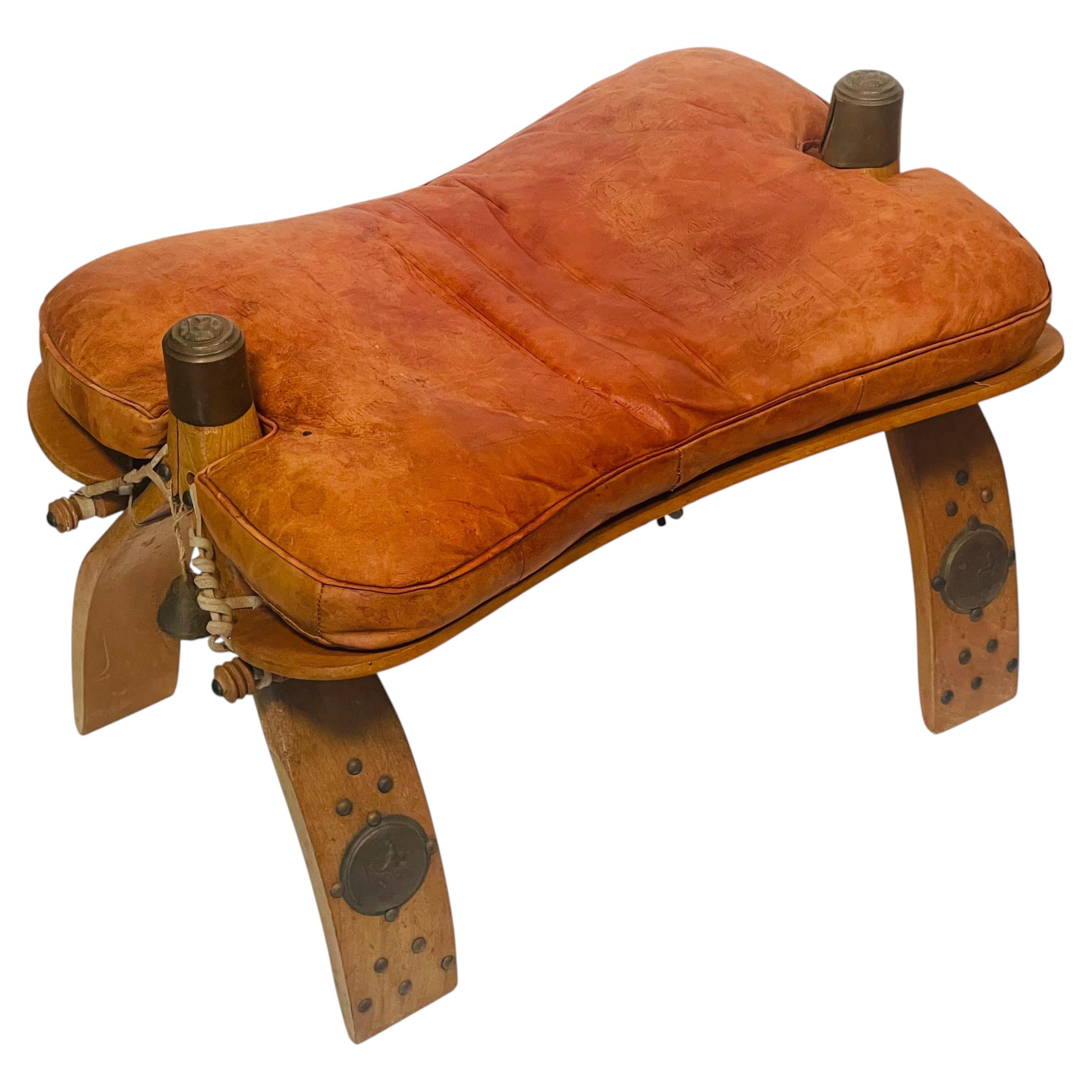 Antique Moroccan Camel Saddle Leather Footstool with Bronze Bell
