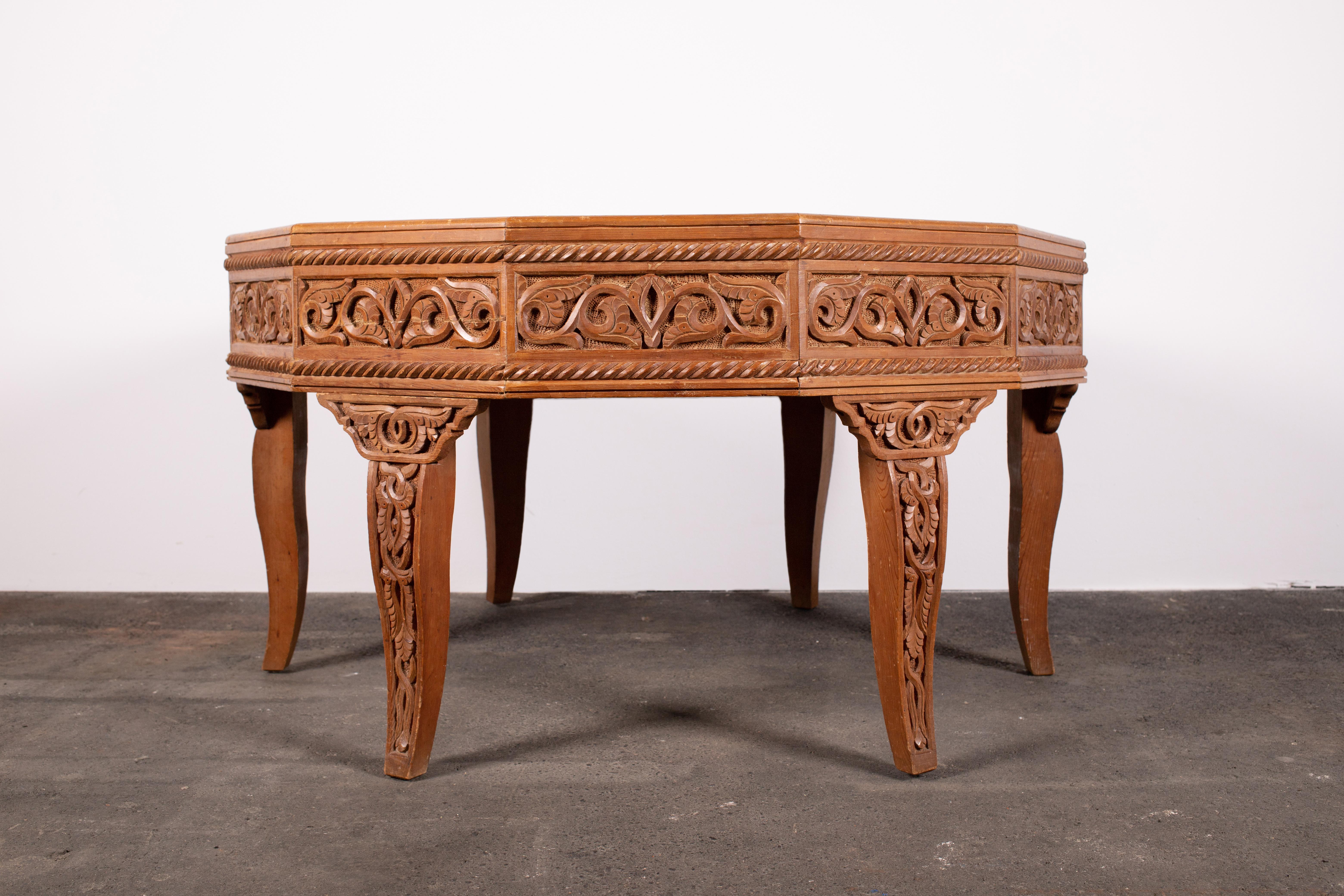 Exceptional craftsmanship and uniquely beautiful wood, both of a bygone era. This 12-sided center table or coffee table is constructed of Atlas Cedar. A wood unique to pockets of the Moroccan Atlas Mountains. An ornamental wood, highly prized for