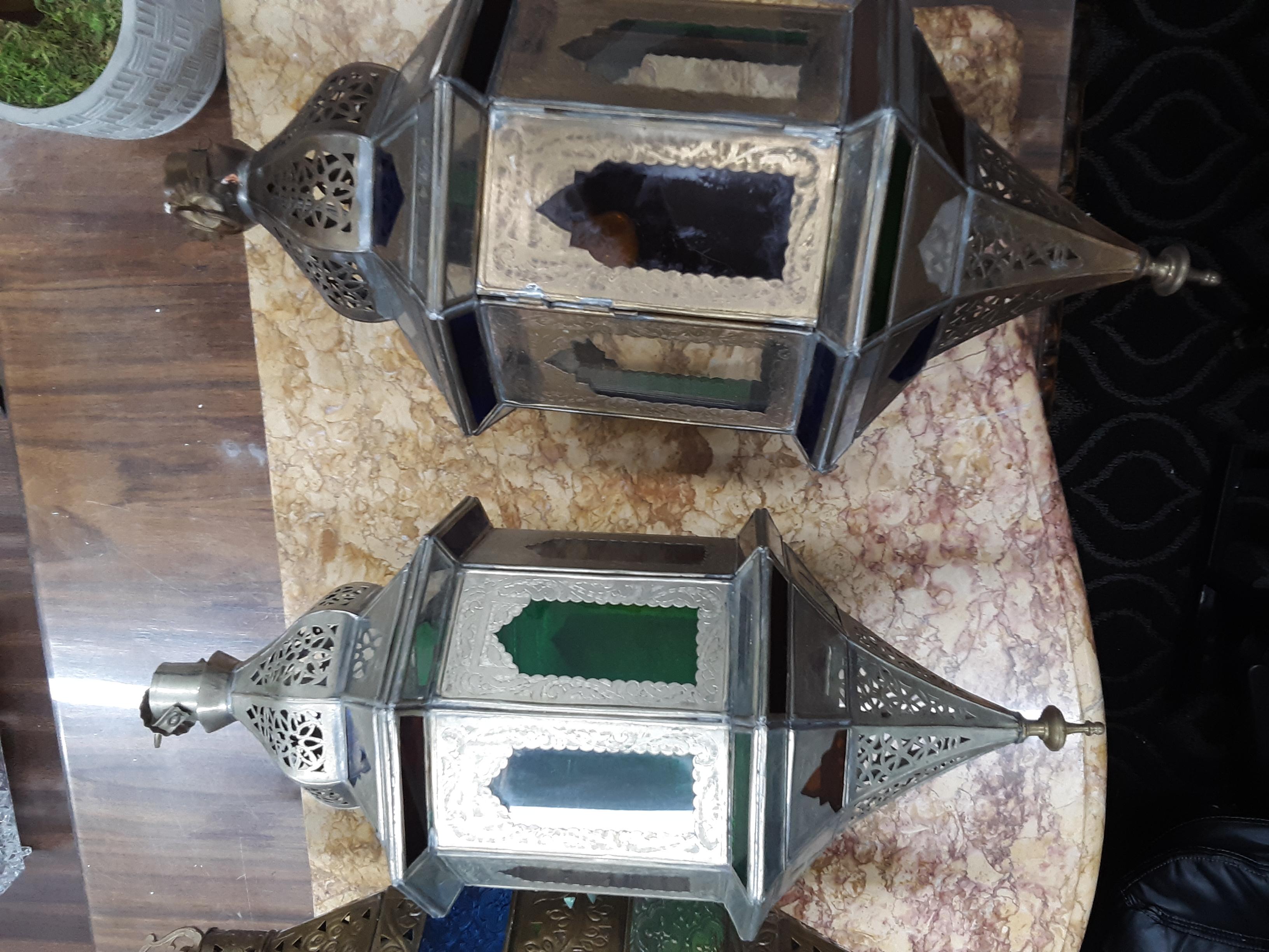 This is a vintage Moroccan art glass lamp set, the way it used to be made. Solid Brass and glasswork. The lamps were retrofitted with electric wiring. This is a true antique and collectors piece.