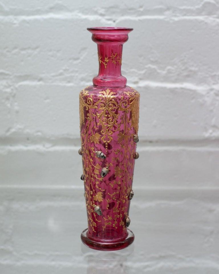 Czech Antique Moser Cranberry Bud Vase with Ornate Gilding and Acorn Motifs For Sale