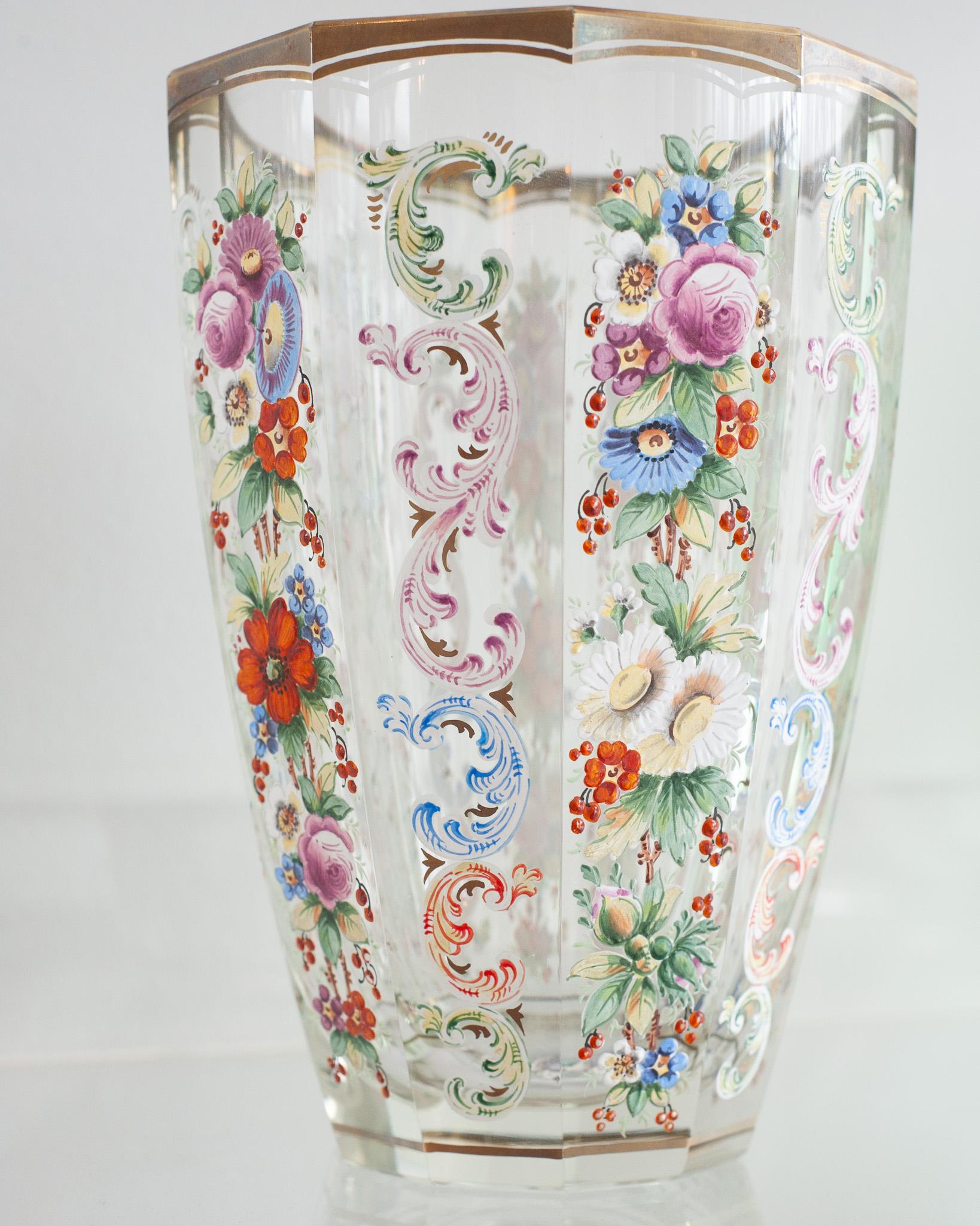 This antique Moser vase from 1900-1920 is just as beautiful as any bouquet of flowers that it could hold. The hand painting on this vase is of an exceptional quality. Sometimes even a small piece can have a grand impact.